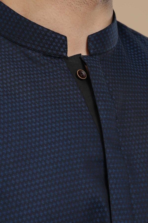 Blue ban-collar kurta closeup with black button placket detail