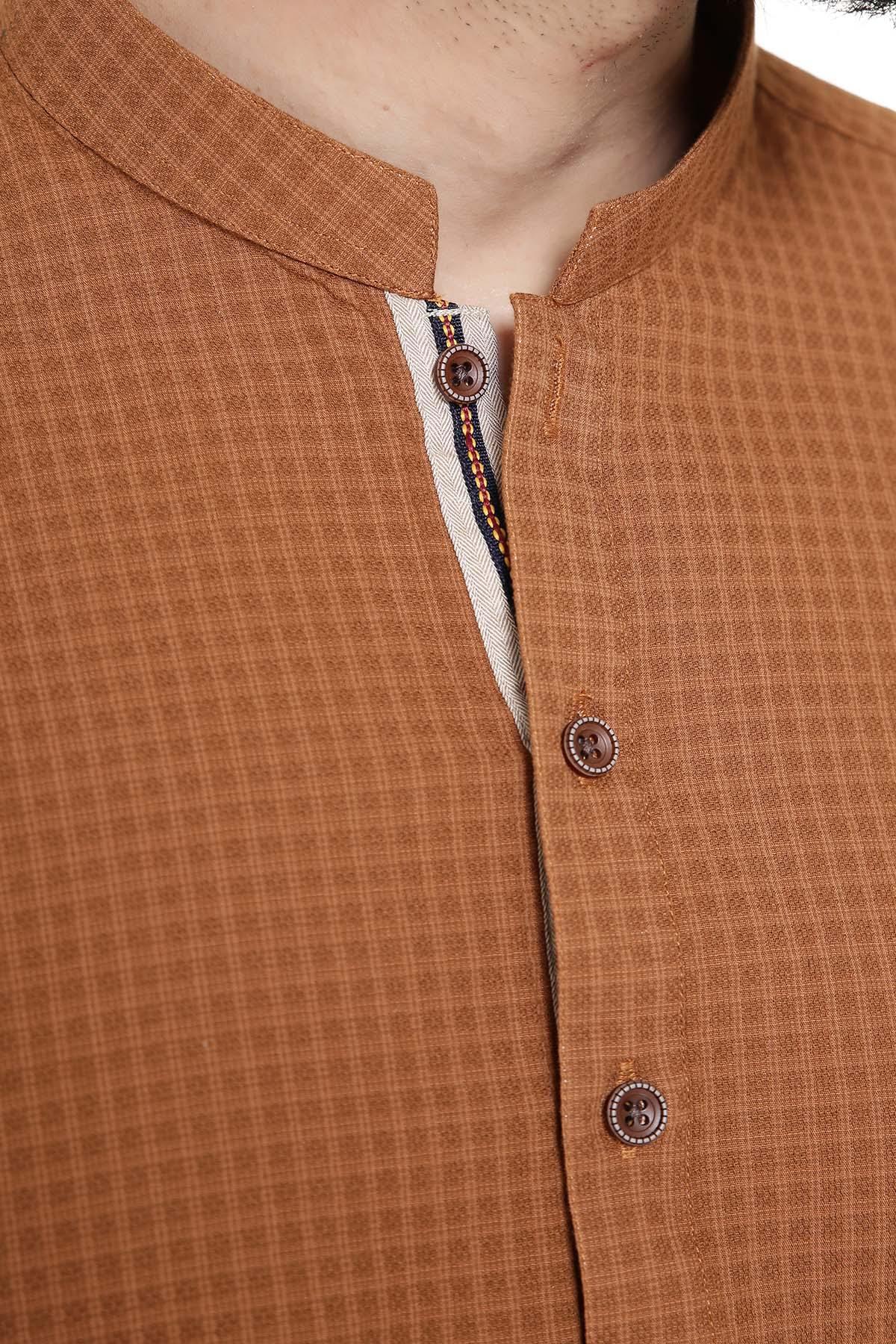 Rust-brown band-collar kurta with circular decorative buttons on the placket