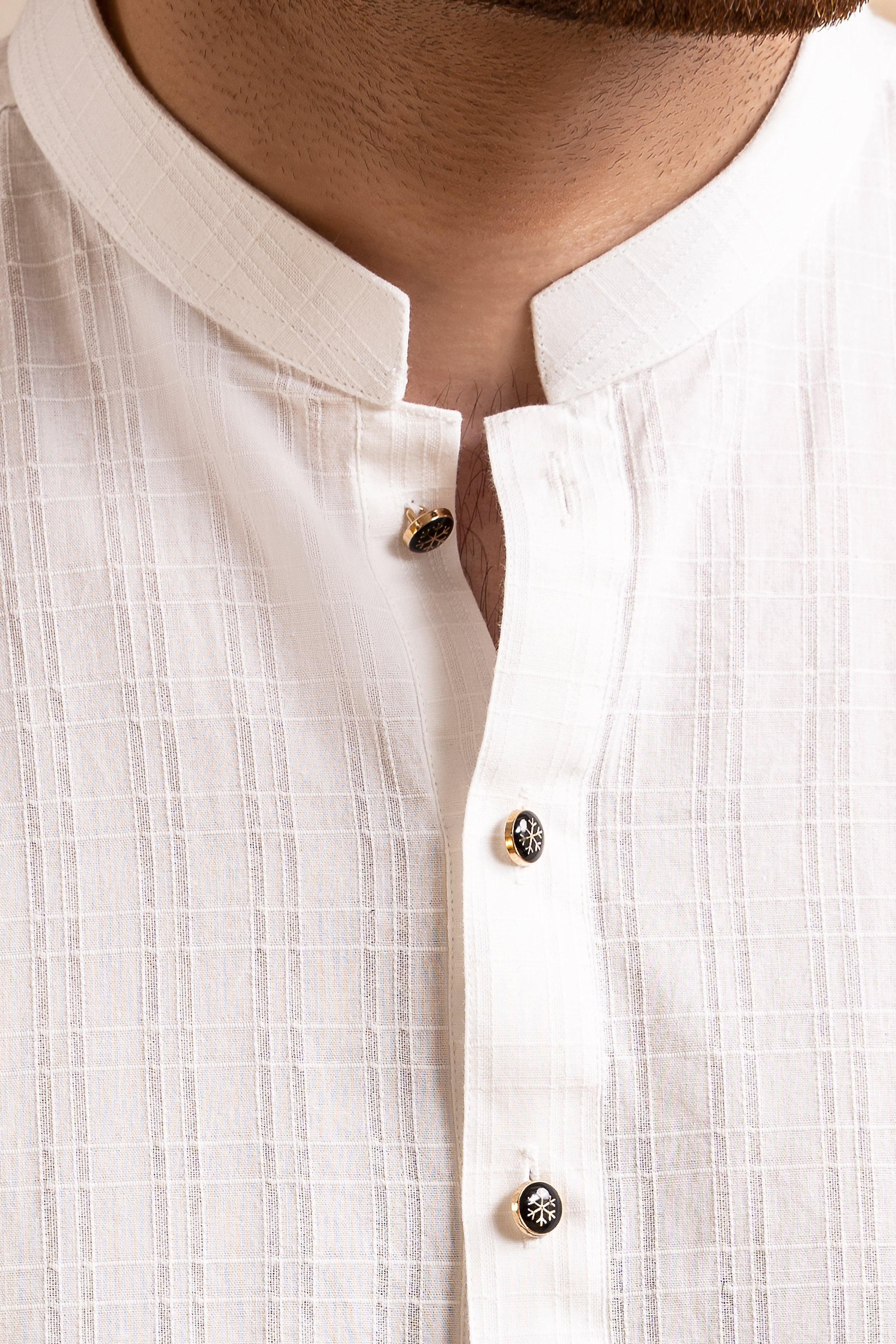Off-white ban collar neckline with button placket and gold buttons