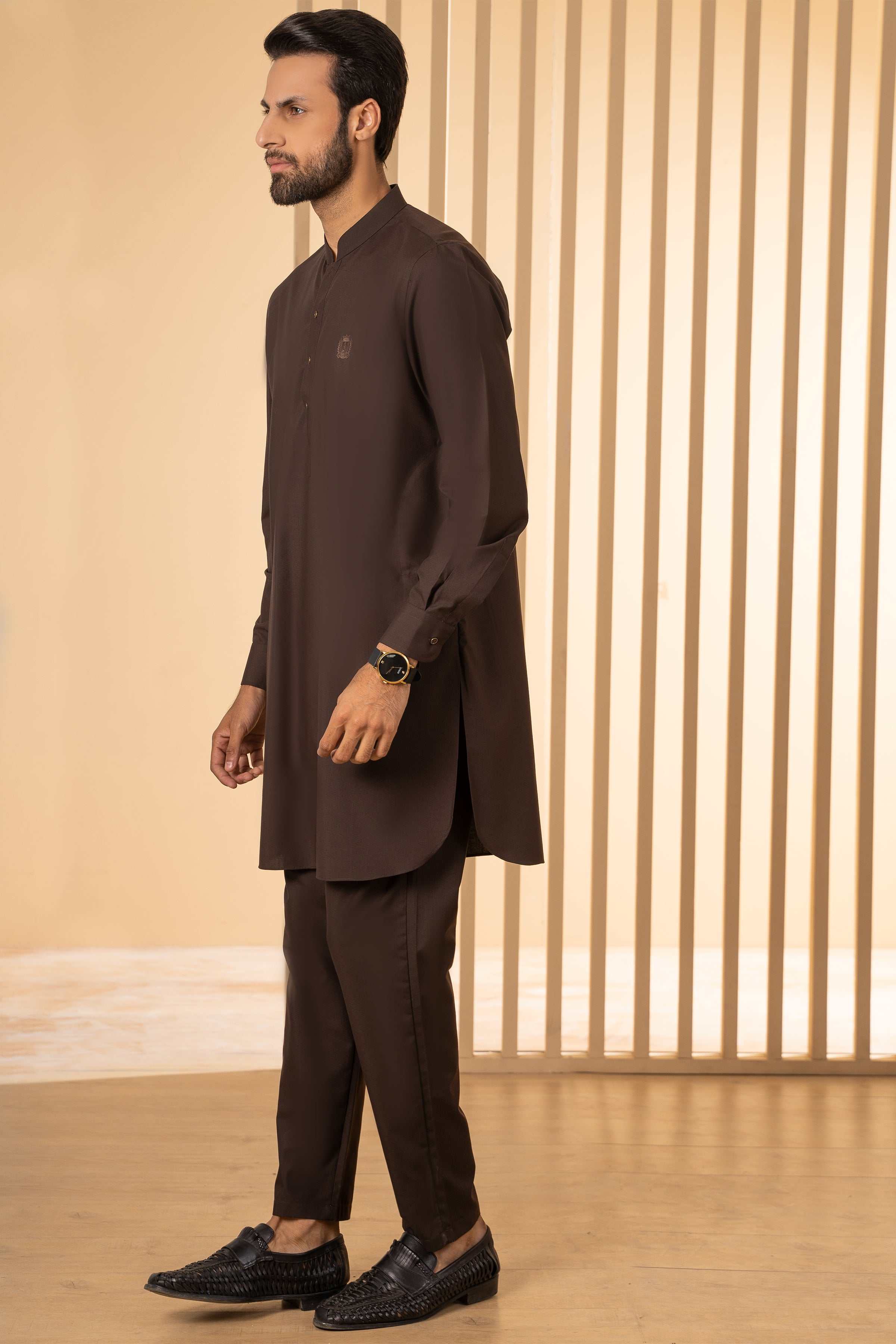 Dark brown kurta pajama set, side view of button-front kurta and straight pants