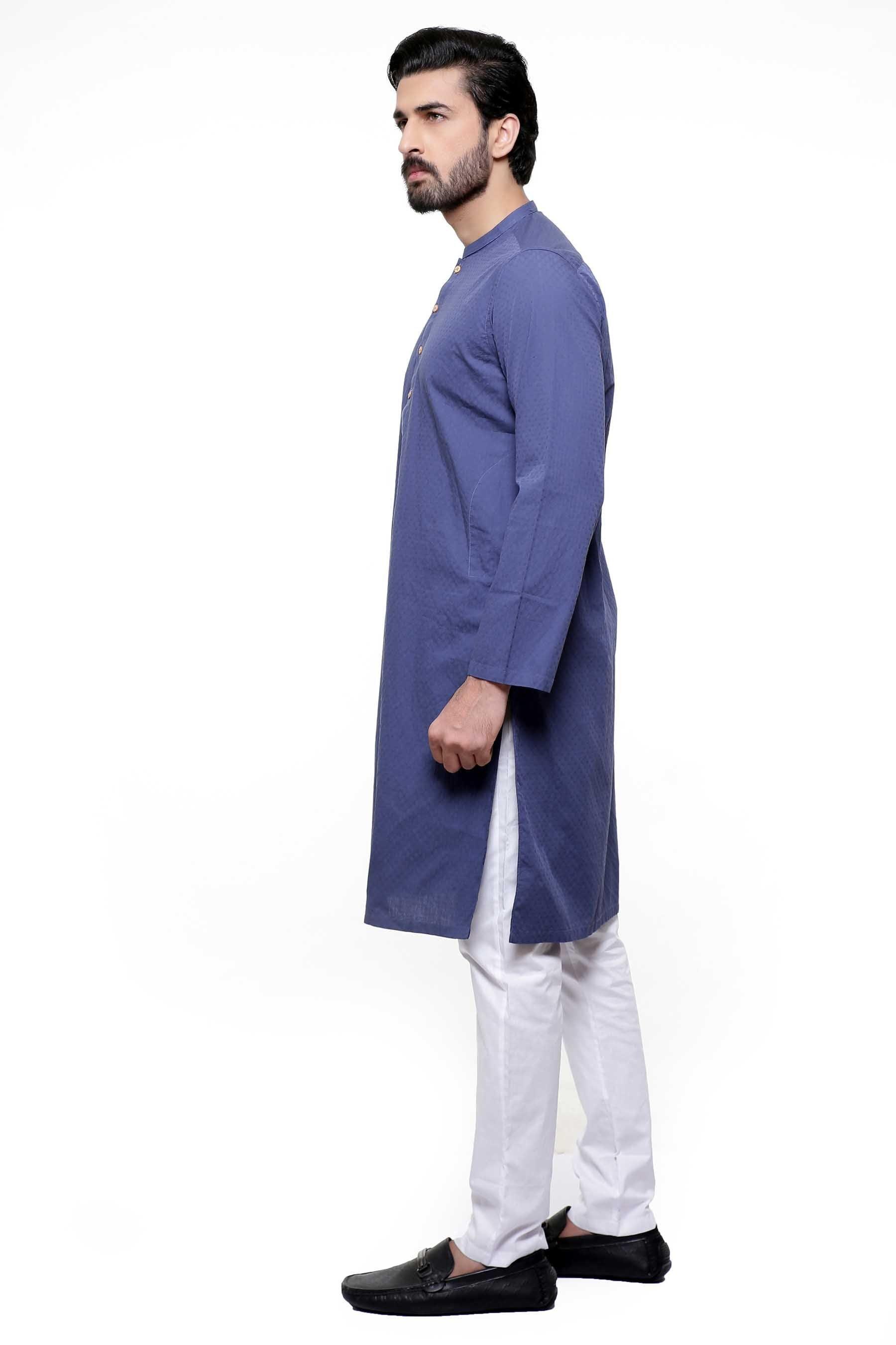 Navy long kurta with buttoned front and long sleeves, worn over white pants