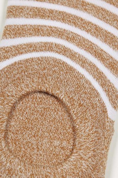 Loafer socks close-up: brown knit with white stripes and padded round toe area