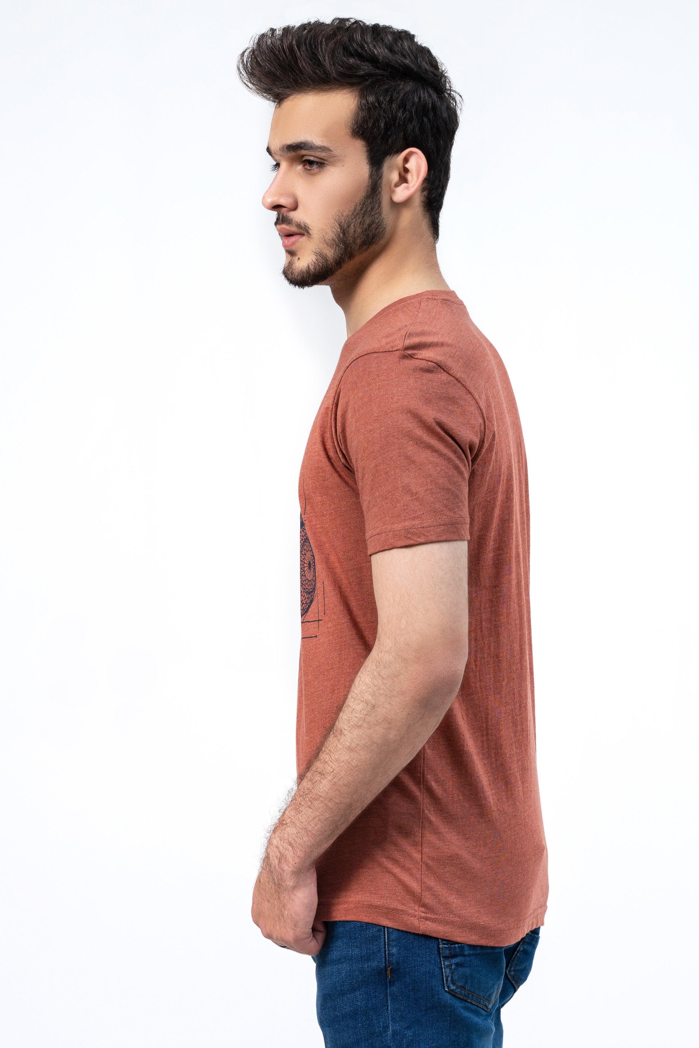 Rust crewneck T-shirt side view with headphone music graphic on the chest