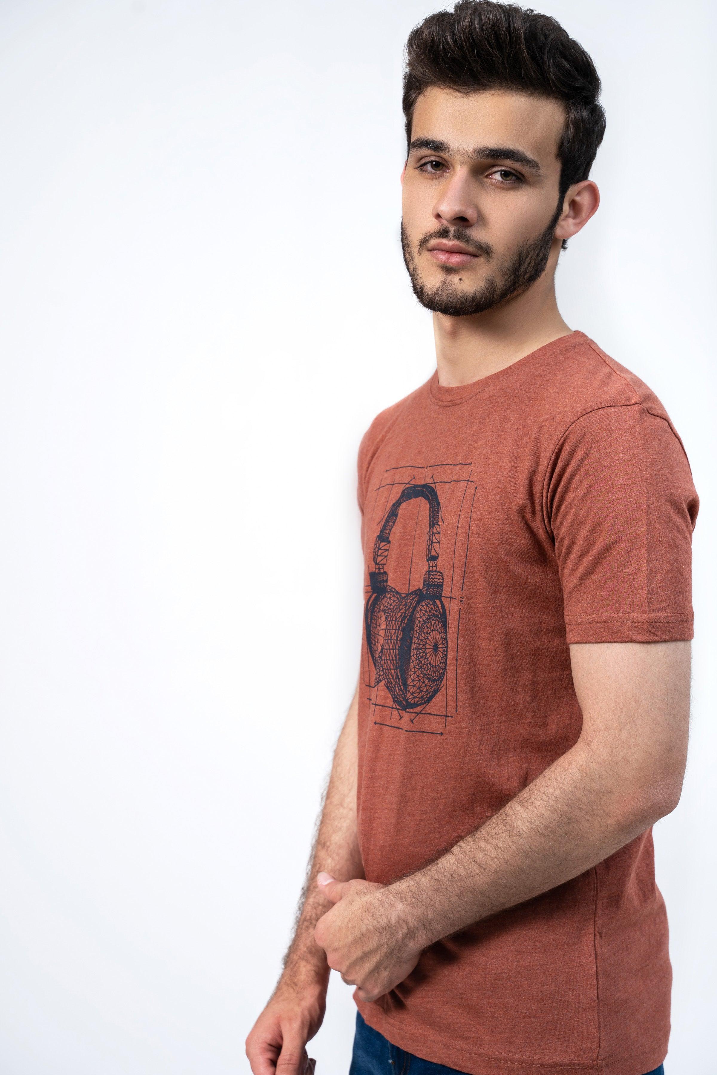 Rust crewneck T-shirt with headphone music graphic on the front, short sleeves