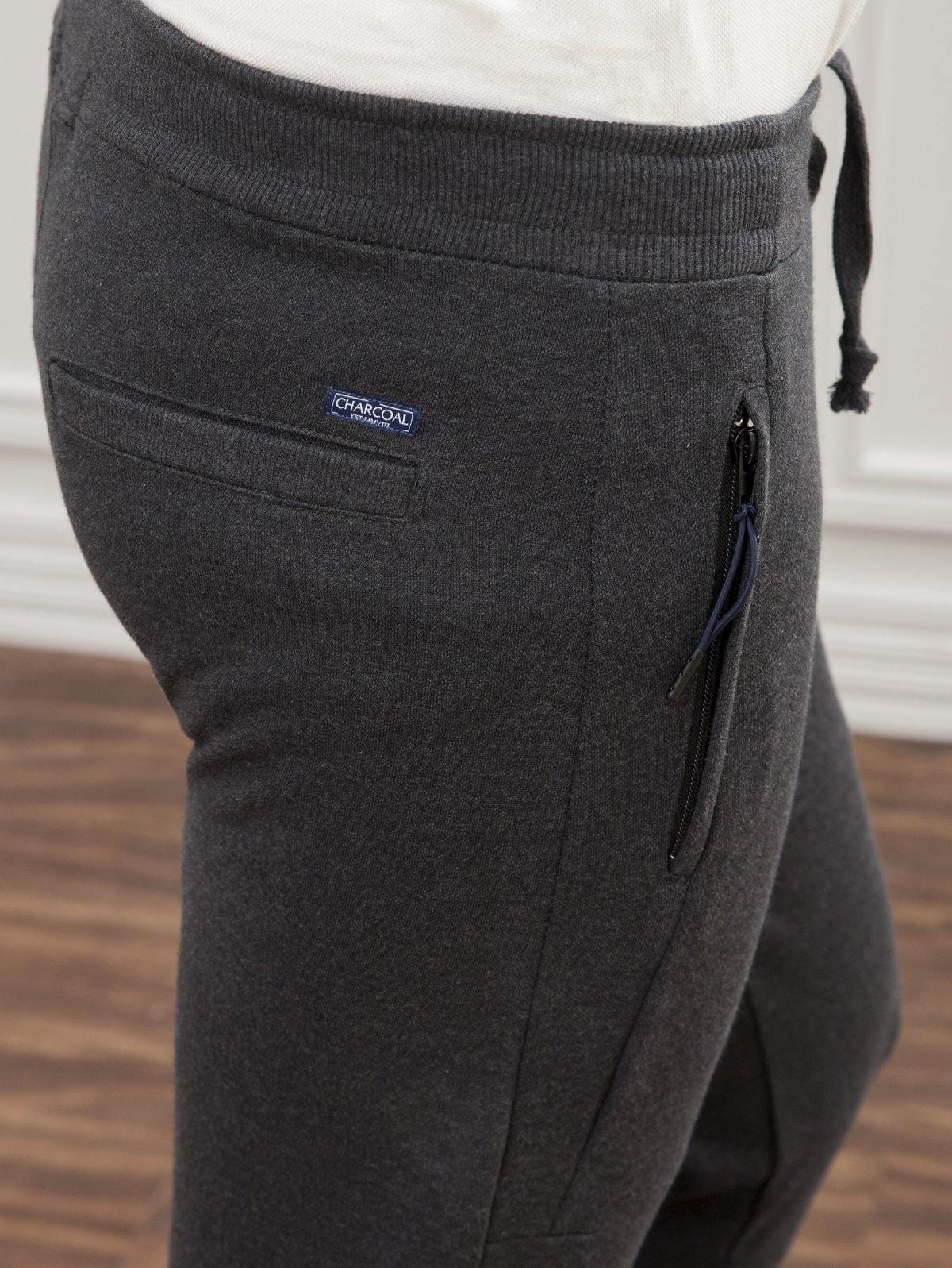 Charcoal melange trousers close-up: side pocket with drawcord detail