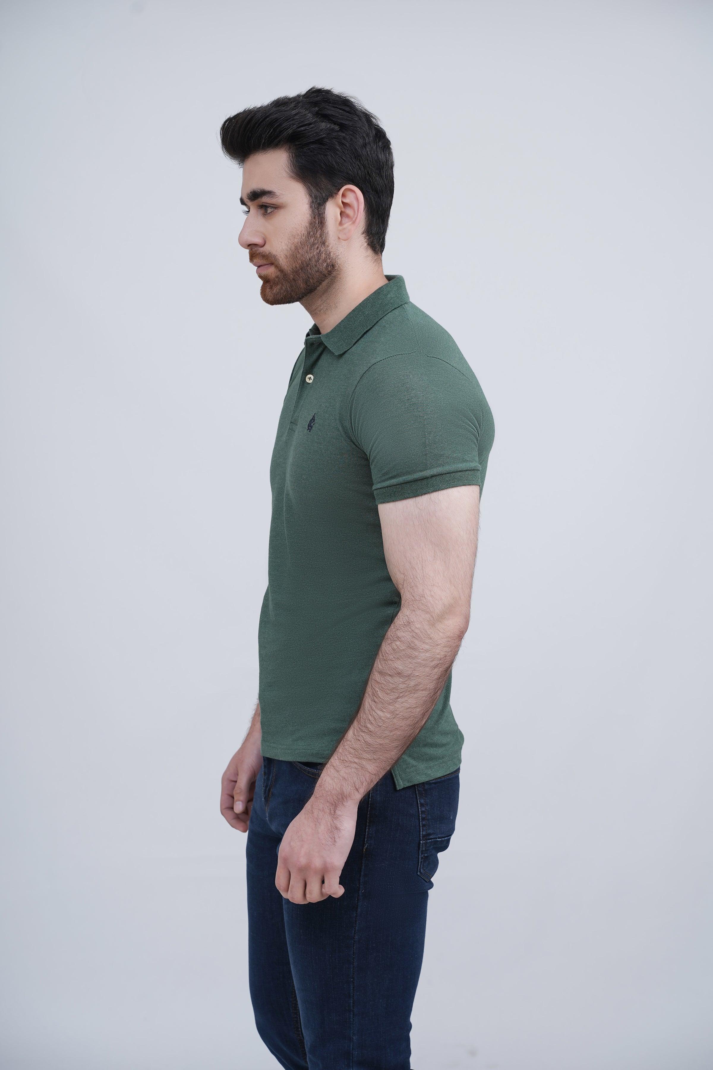 Green polo shirt side view with short sleeves, ribbed collar, and button placket