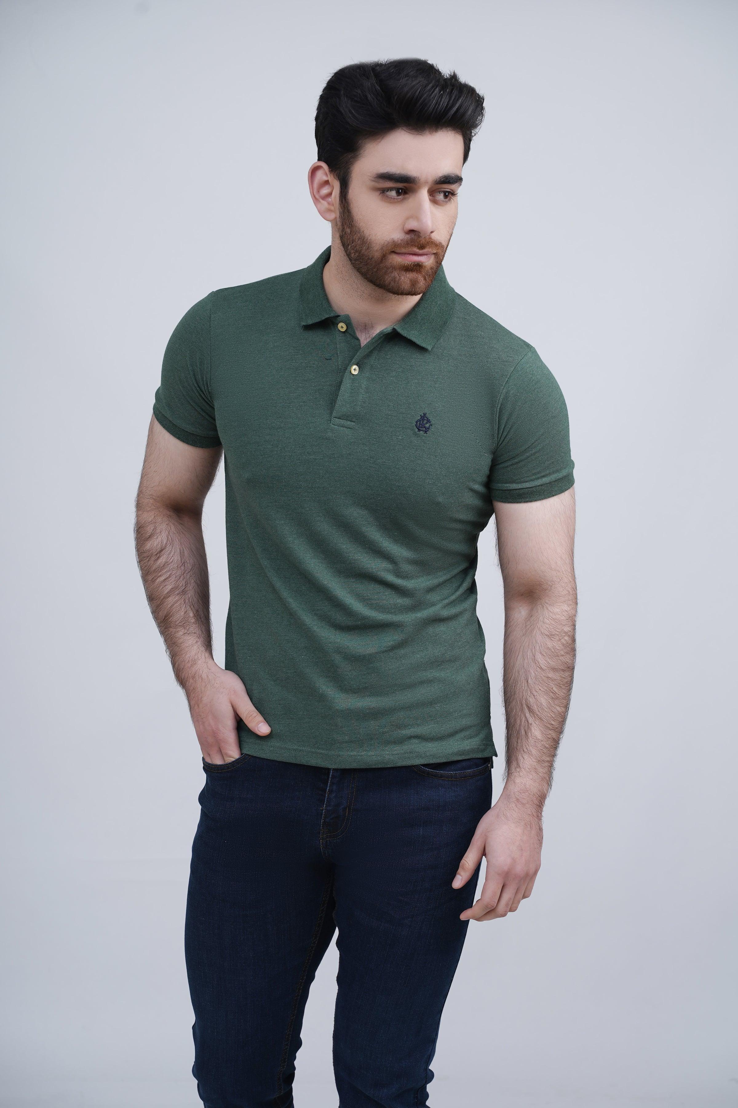 Green polo shirt with short sleeves, ribbed collar, and button placket, chest logo detail