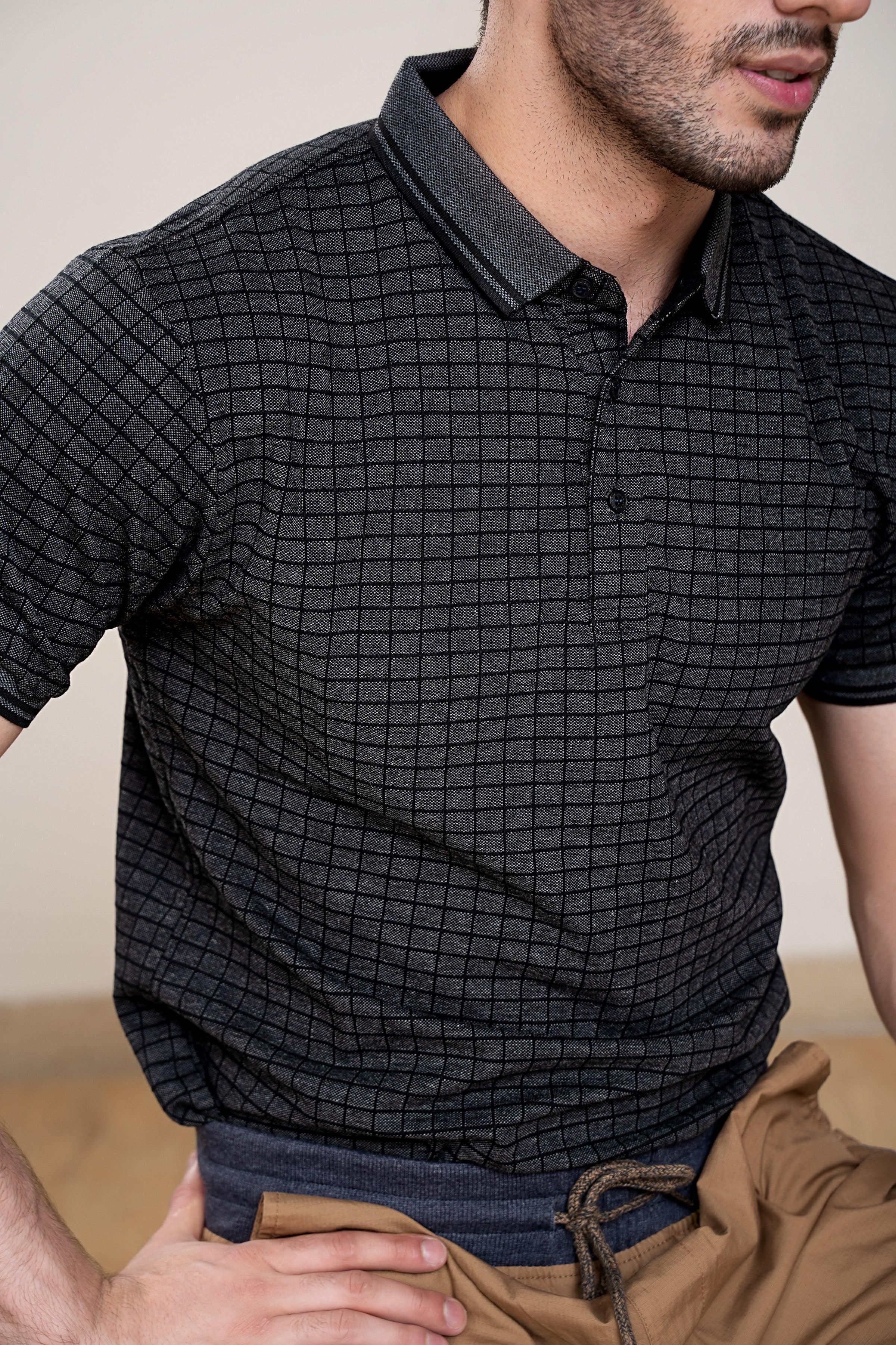 Charcoal grid-pattern polo shirt close-up, button front and ribbed collar