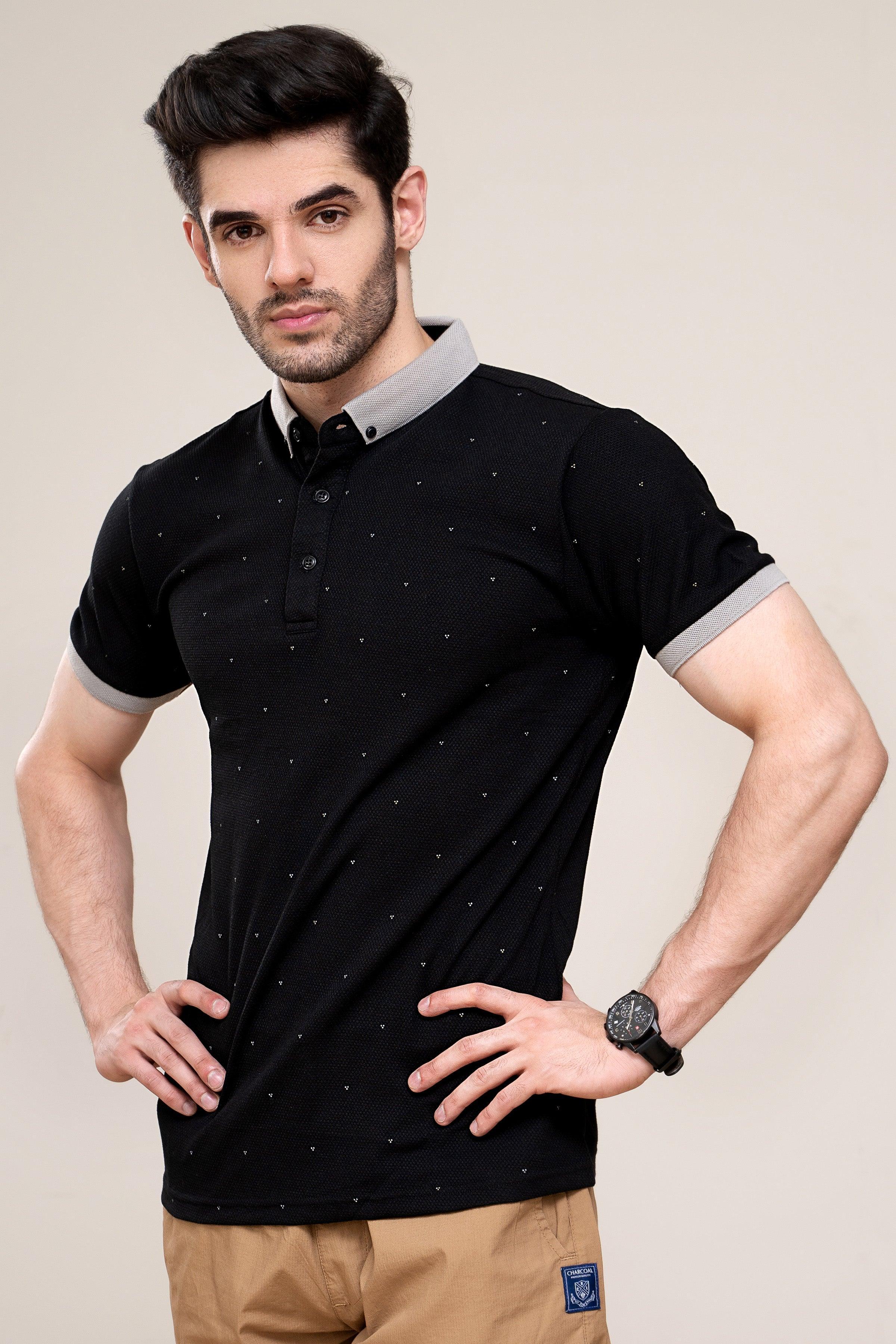 Black polo shirt with white collar trim and button placket, short sleeves