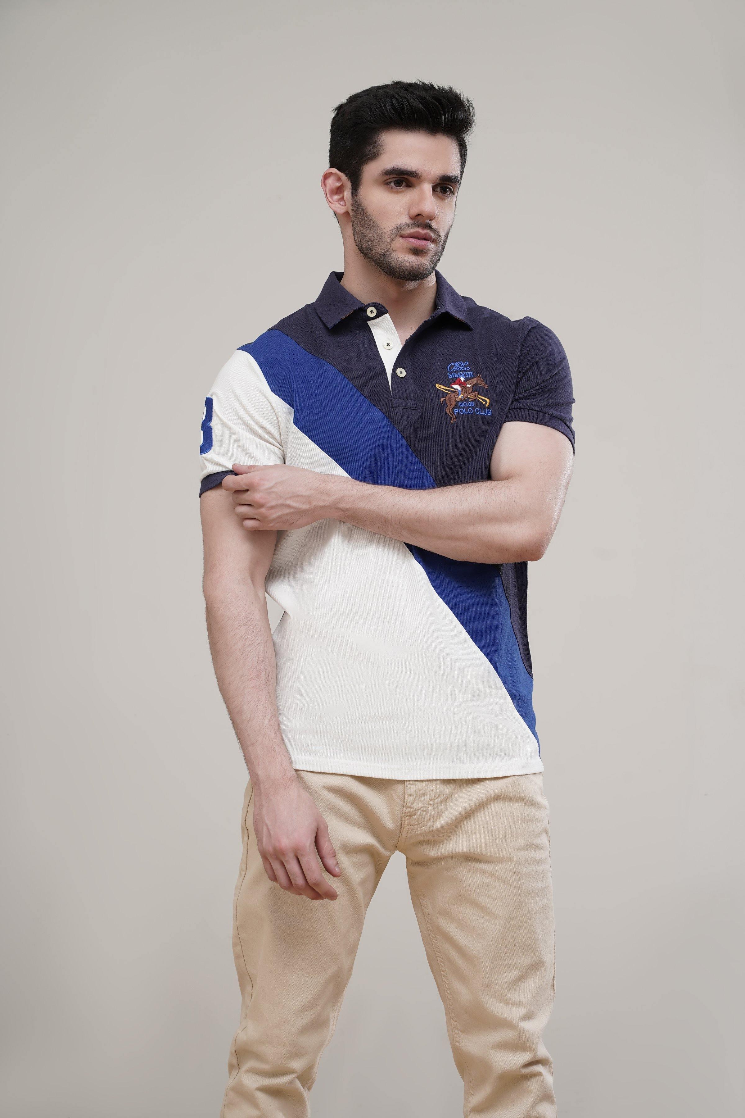 Navy polo shirt with diagonal white cross panel, three-button placket, embroidered chest logo
