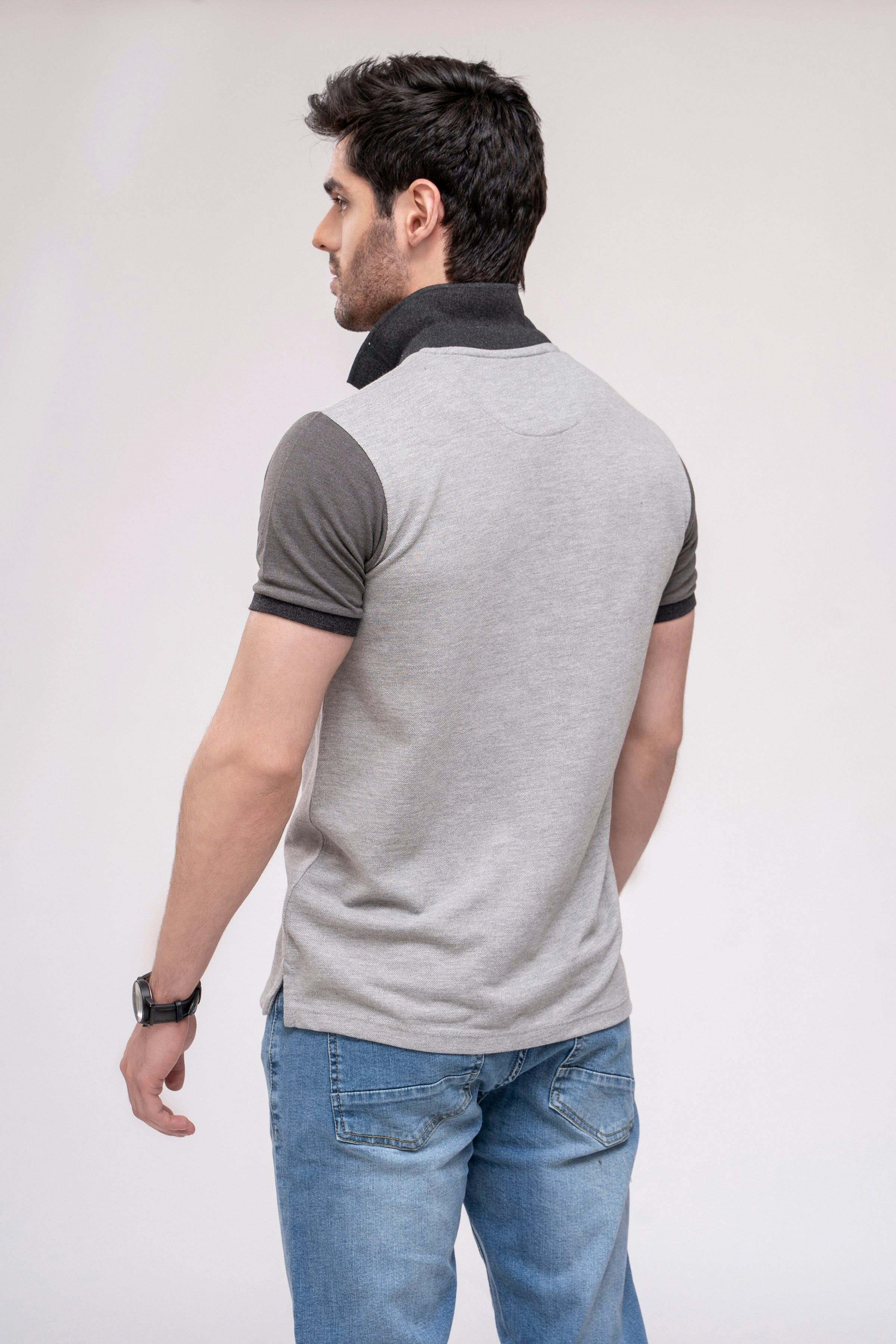 Grey polo shirt back view with dark collar and dark sleeve cuffs