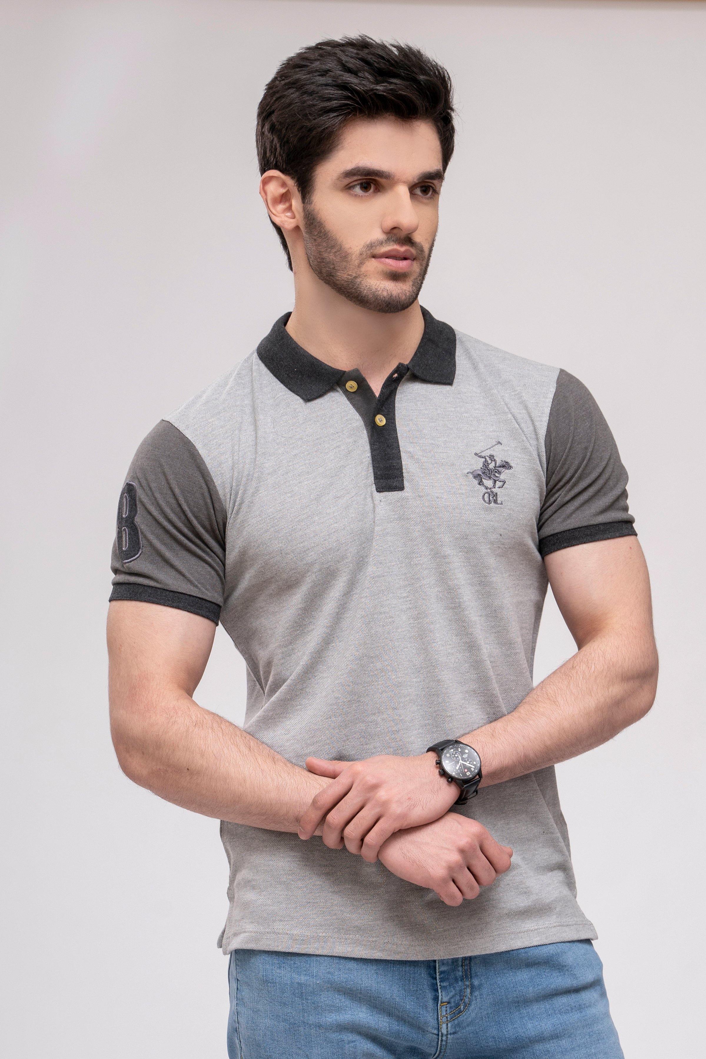 Grey polo shirt with dark collar, button placket, and small chest logo