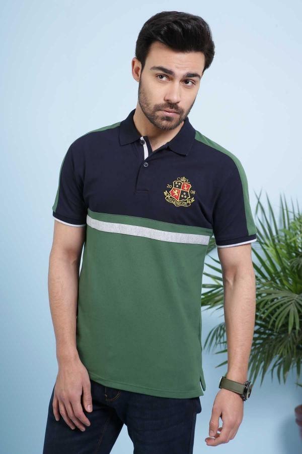 Navy green polo shirt with striped trim and chest crest on the left