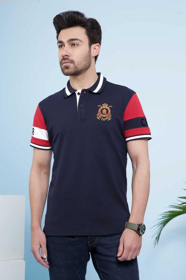 Navy polo shirt with button collar, crest logo, and red striped sleeves