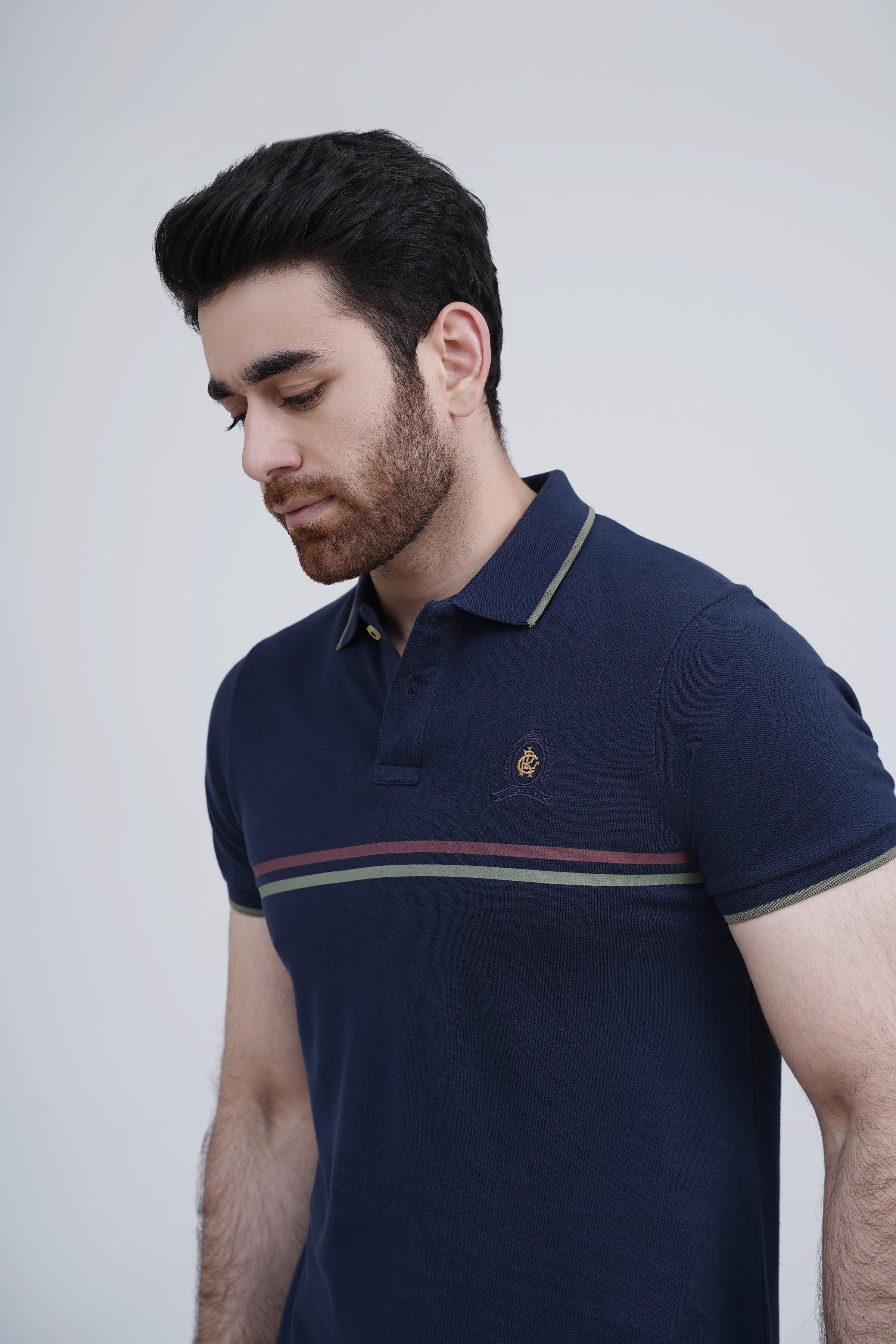 Navy polo shirt with striped chest band and small logo on left