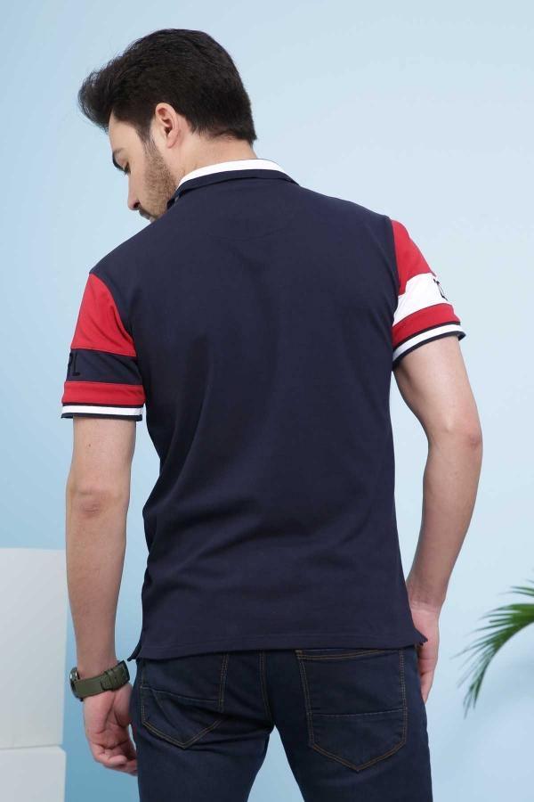 Navy polo shirt back view with red striped sleeve cuffs