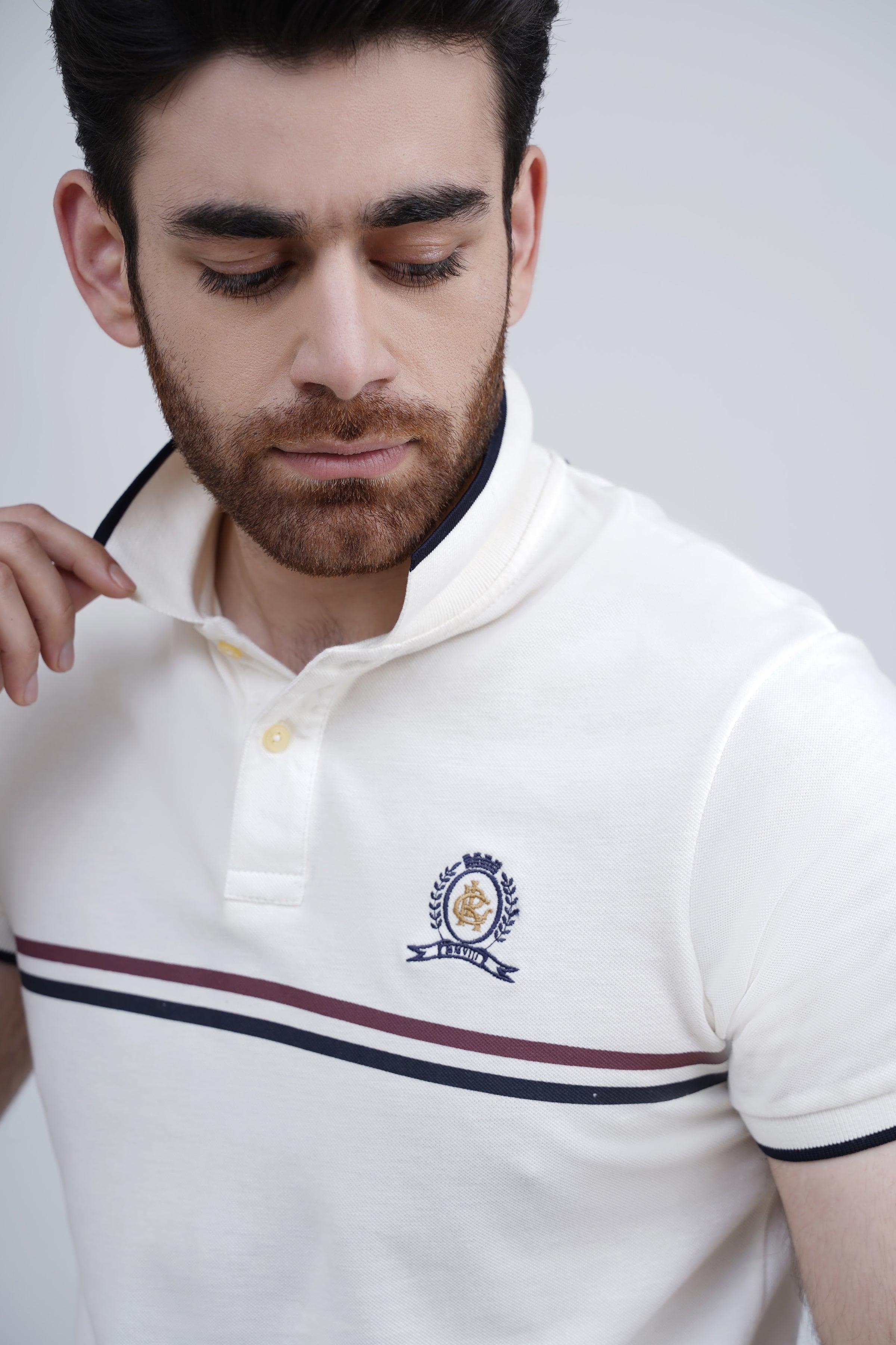 Off-white polo shirt close-up of embroidered chest crest and striped hem