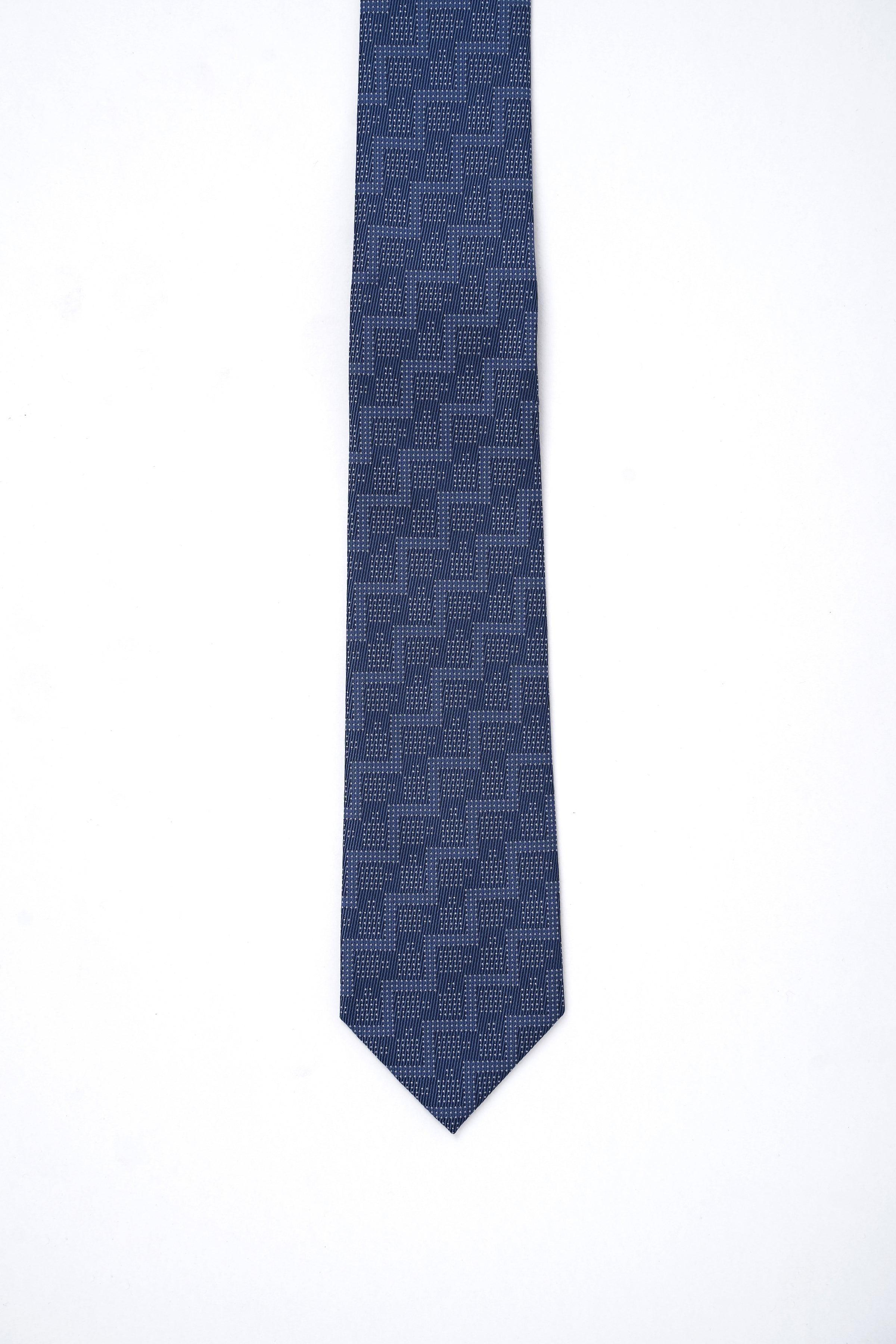 Navy blue patterned tie, straight view with pointed tip
