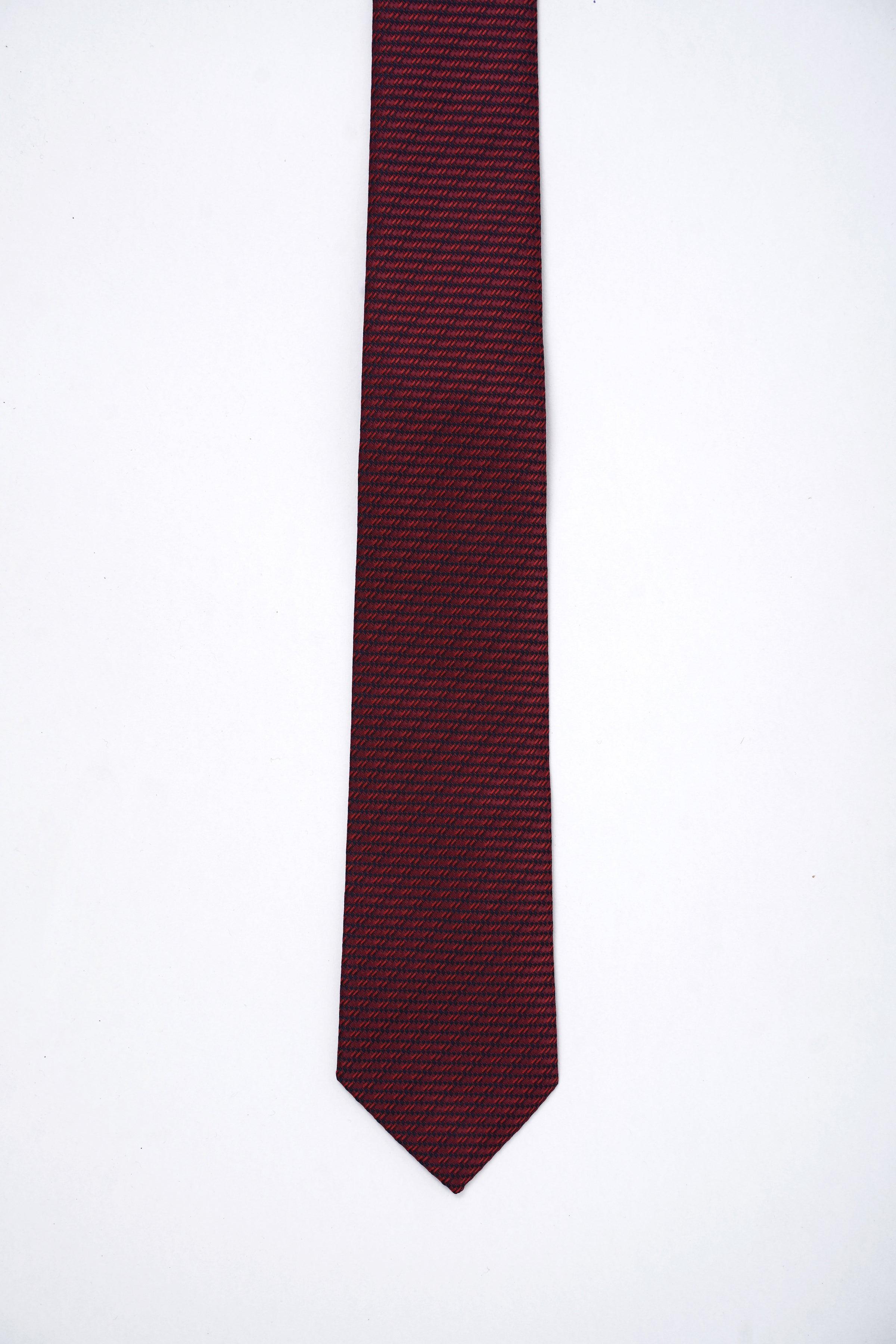 Burgundy textured necktie with pointed tip, hanging straight