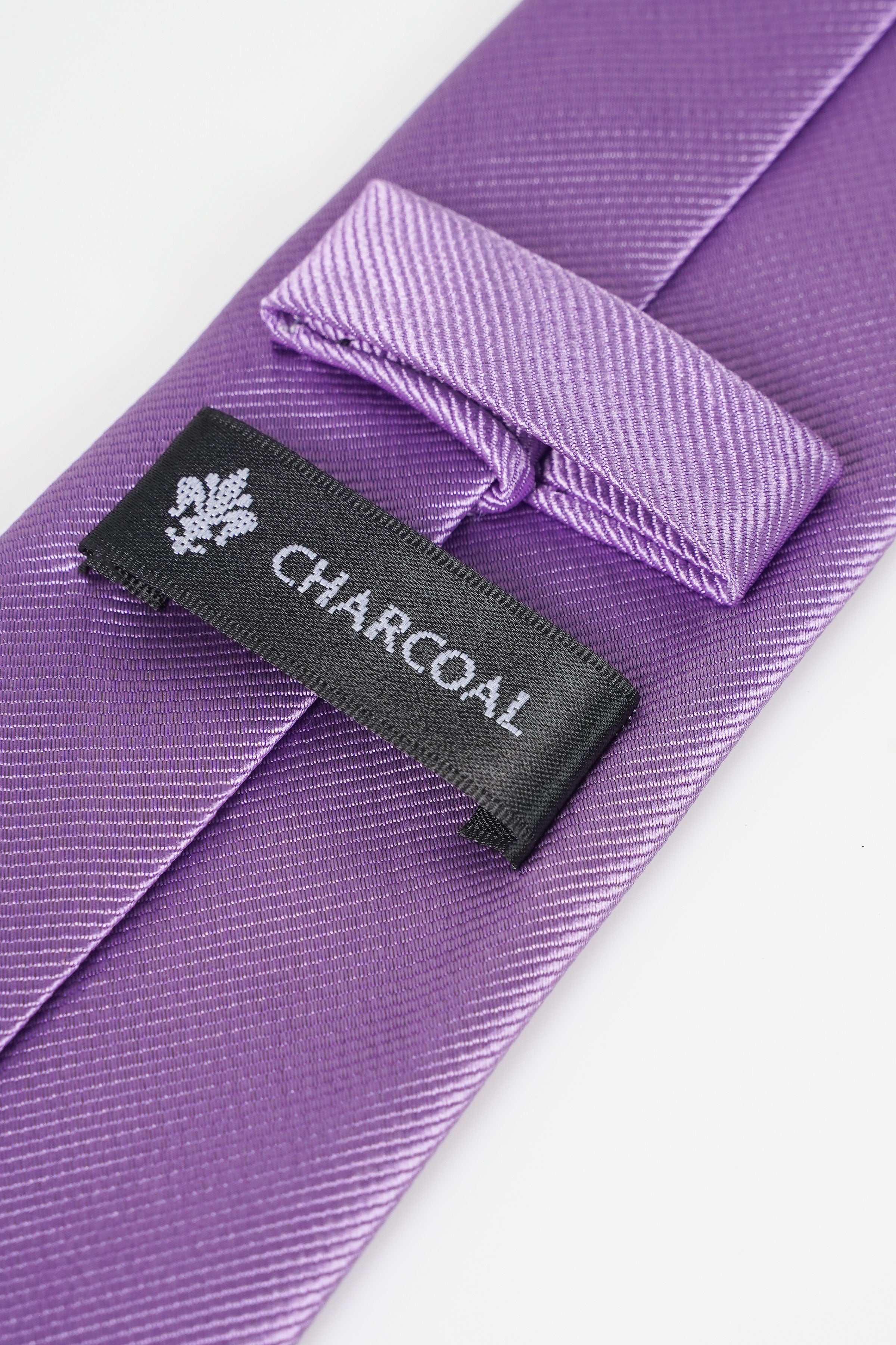 Poly silk tie in light purple with CHARCOAL label and folded keeper