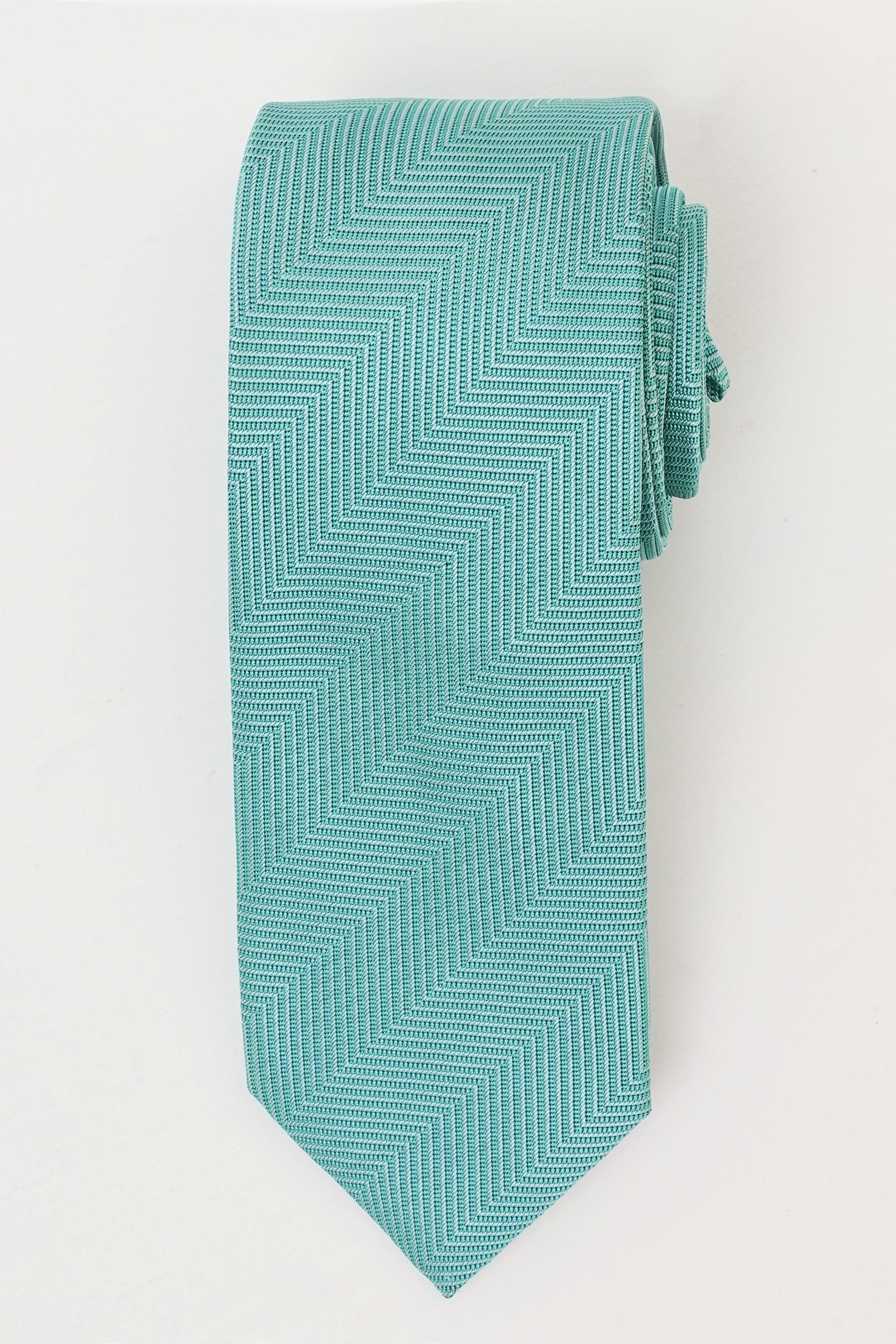 Turquoise poly silk tie with repeating chevron pattern and pointed tip