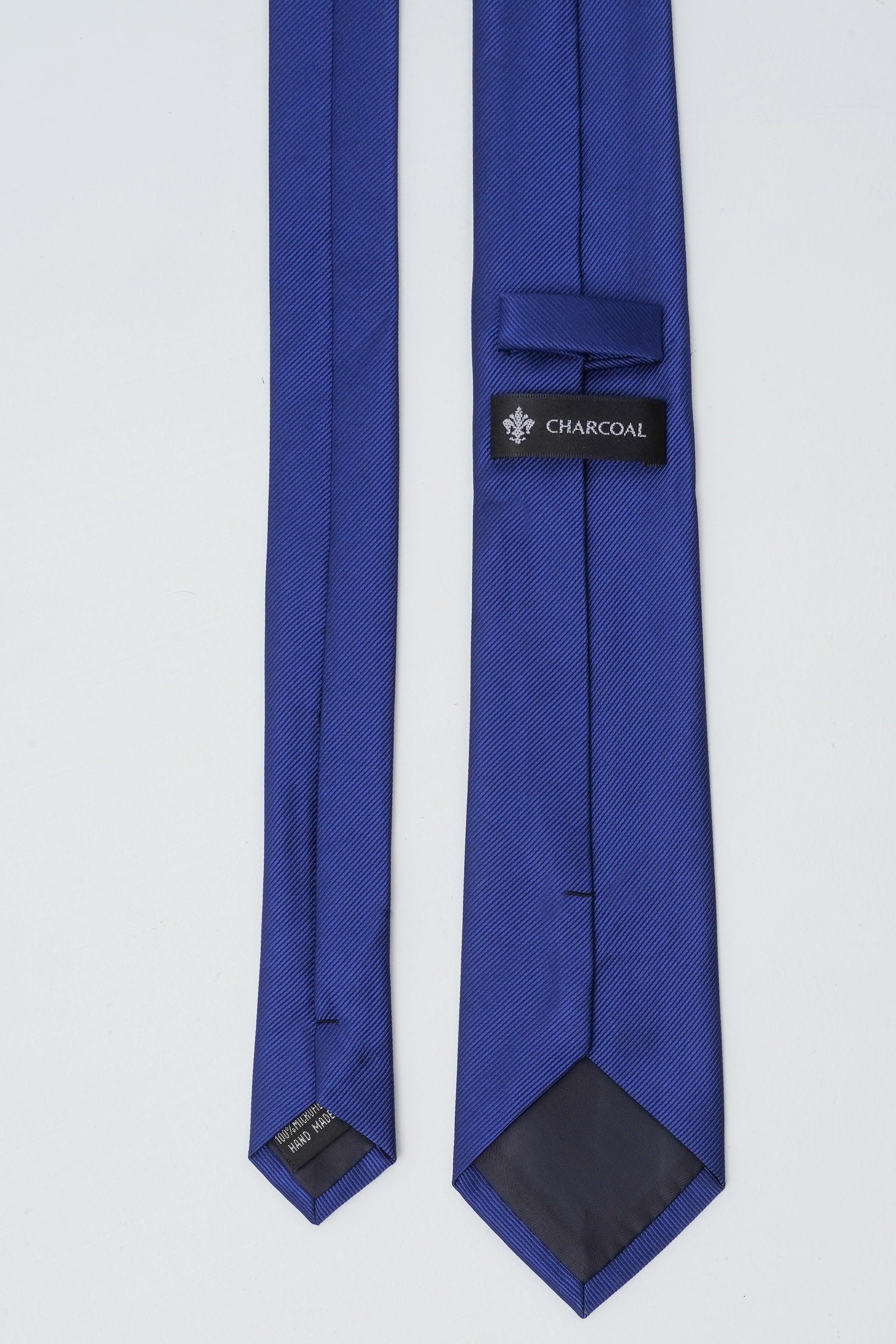 Blue polyester silk tie with back clip and CHARCOAL label