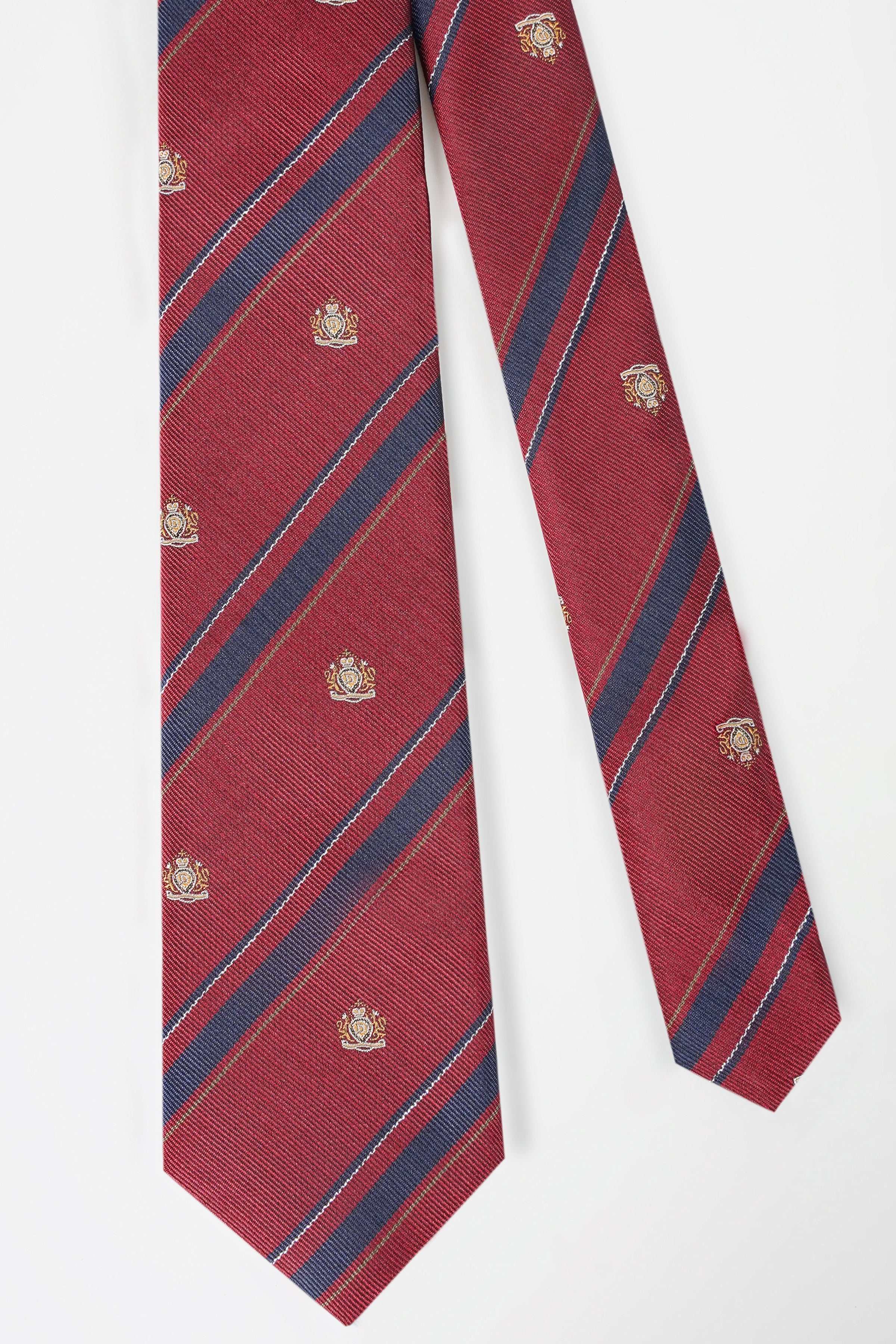 Red necktie with diagonal navy stripes and gold crest pattern, straight view