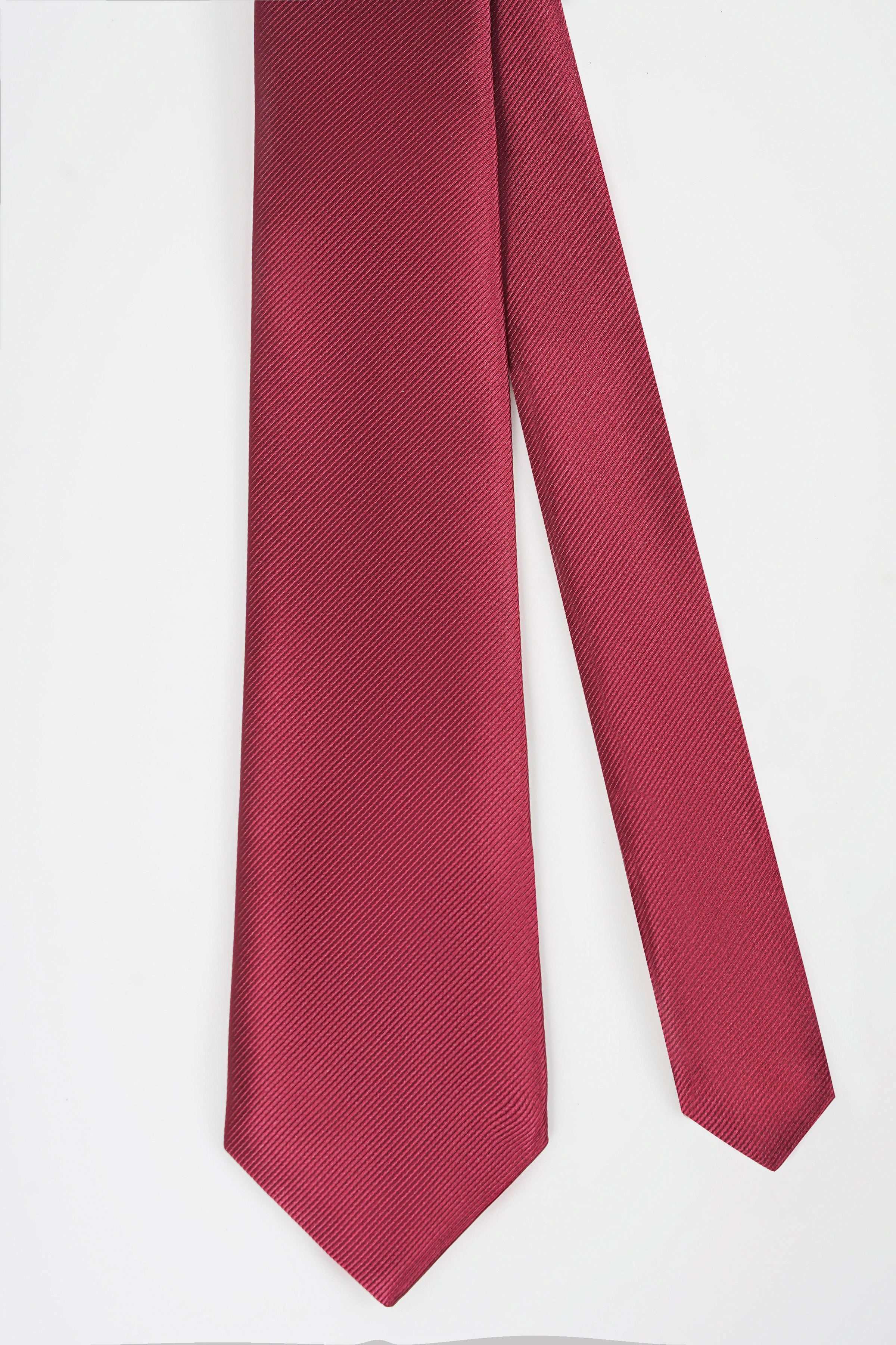 Maroon textured necktie with fine diagonal pattern, long narrow ends
