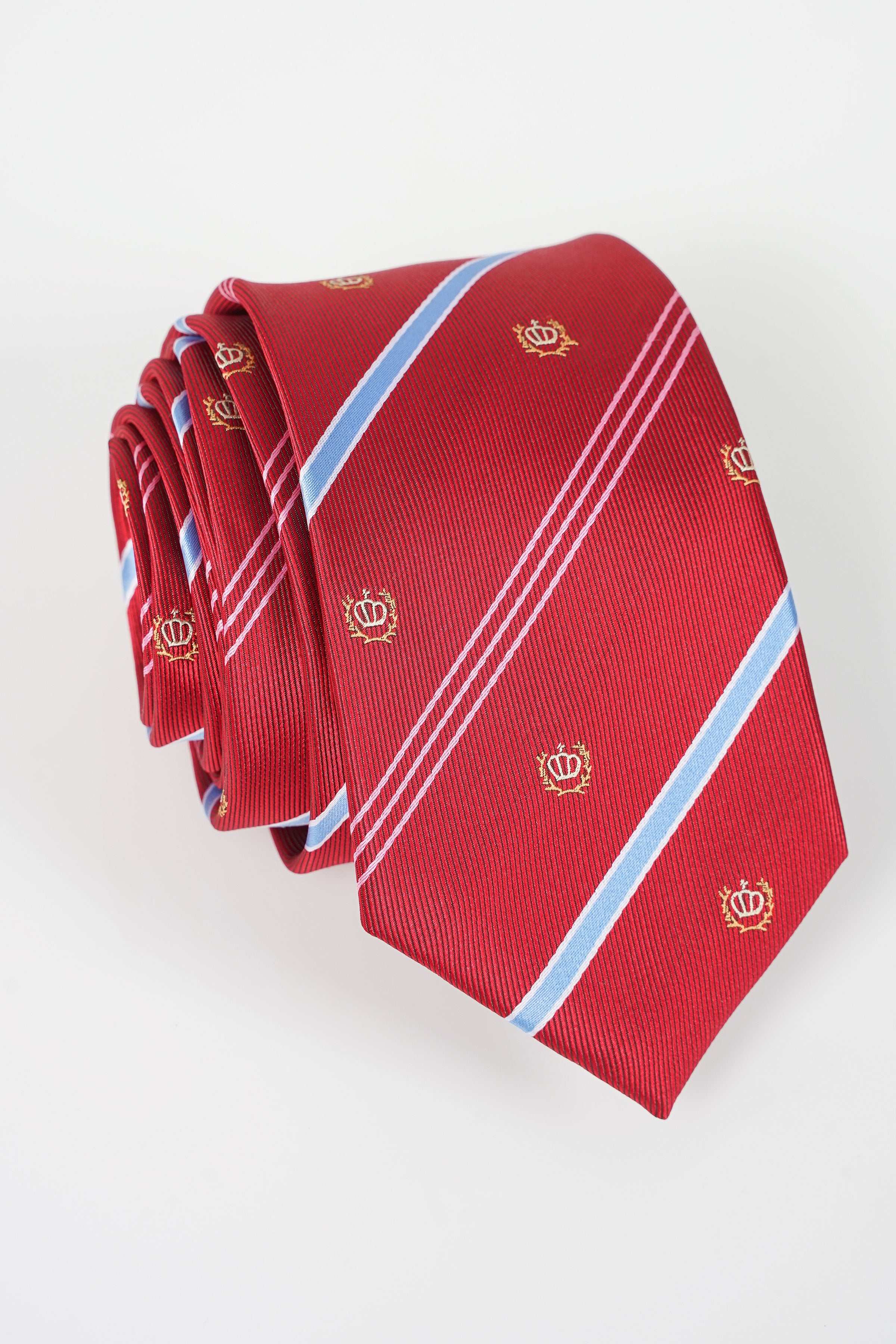 Red poly silk tie with light blue diagonal stripes and small crest icons