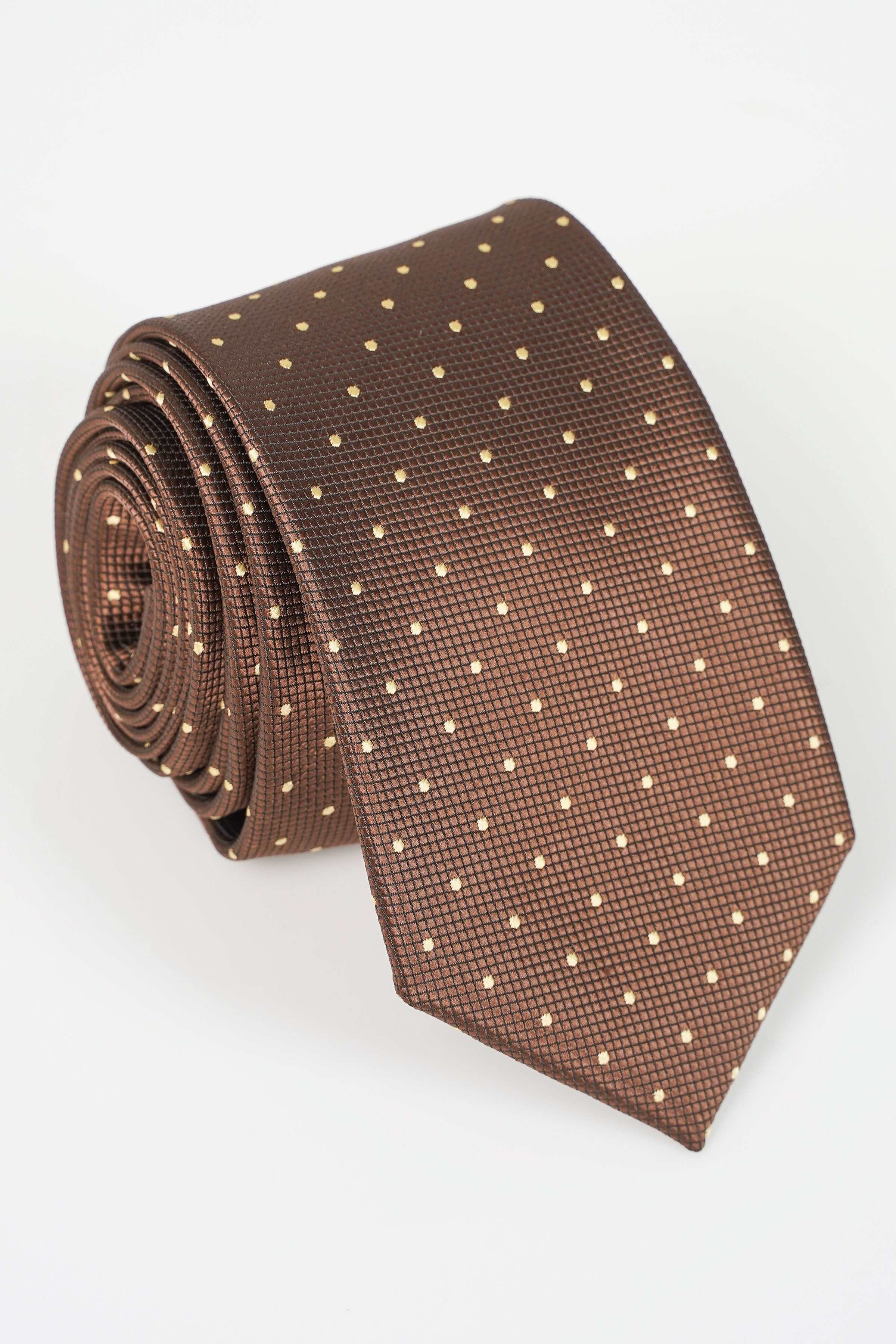 Brown necktie with small gold dot pattern, shown rolled in a curved view