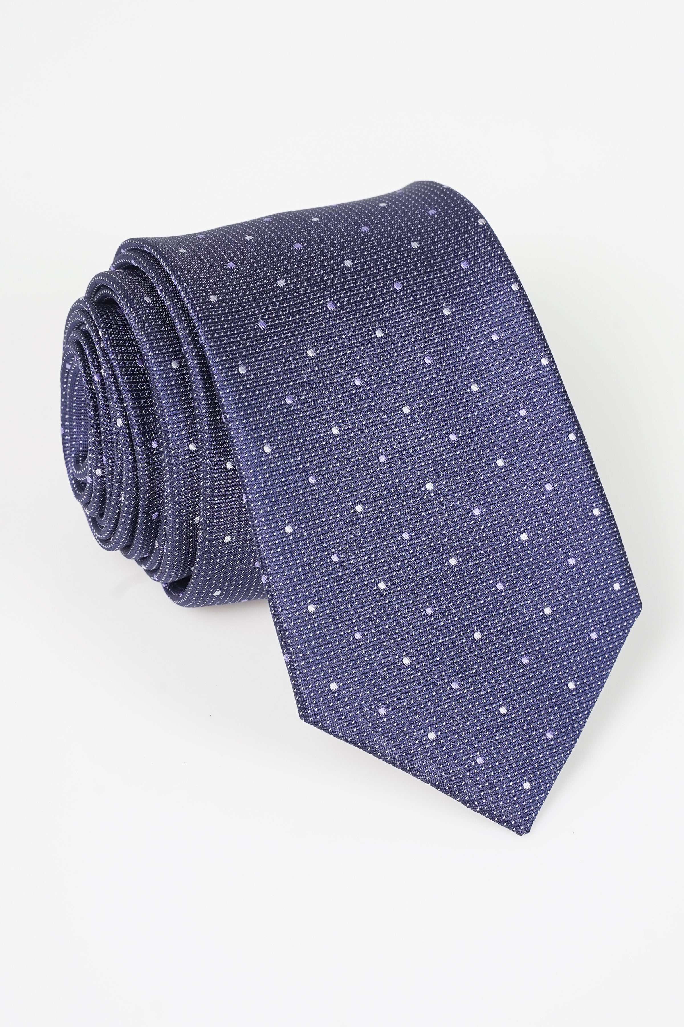 Rolled dark blue polyester silk tie with small white dot pattern