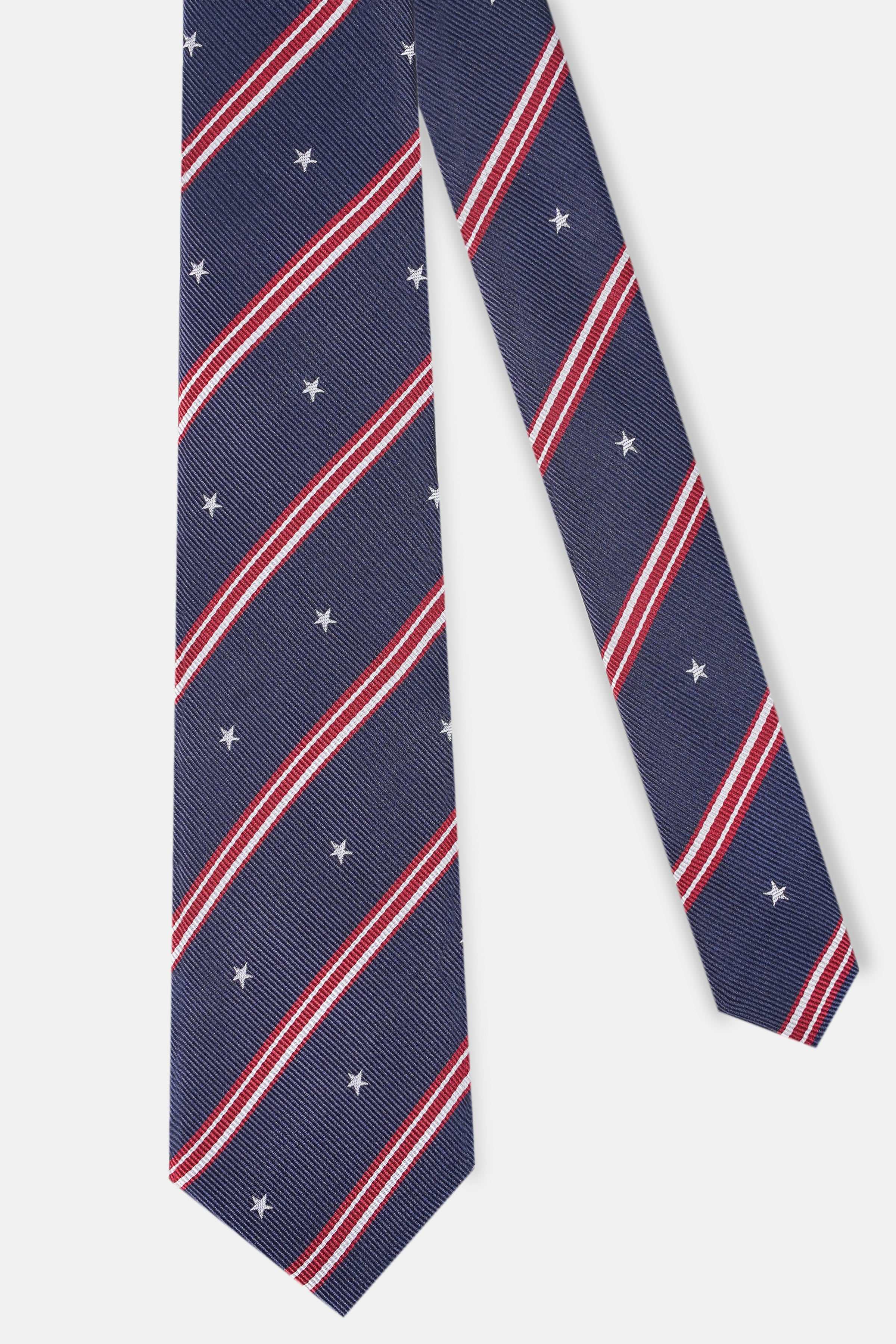 Navy poly silk tie with red-and-white diagonal stripes and star motifs