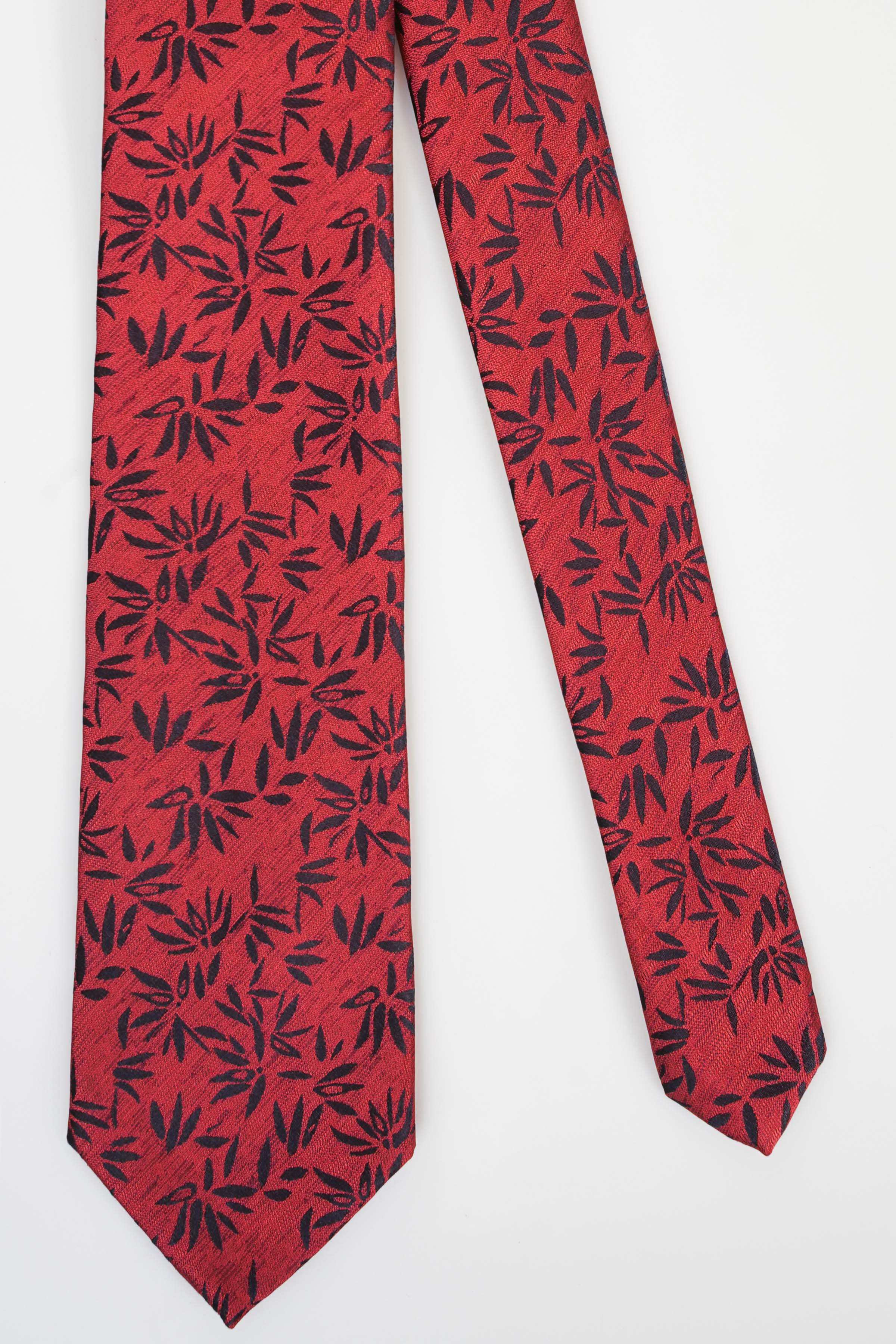 Red leaf-pattern necktie with narrow width and angled pointed end