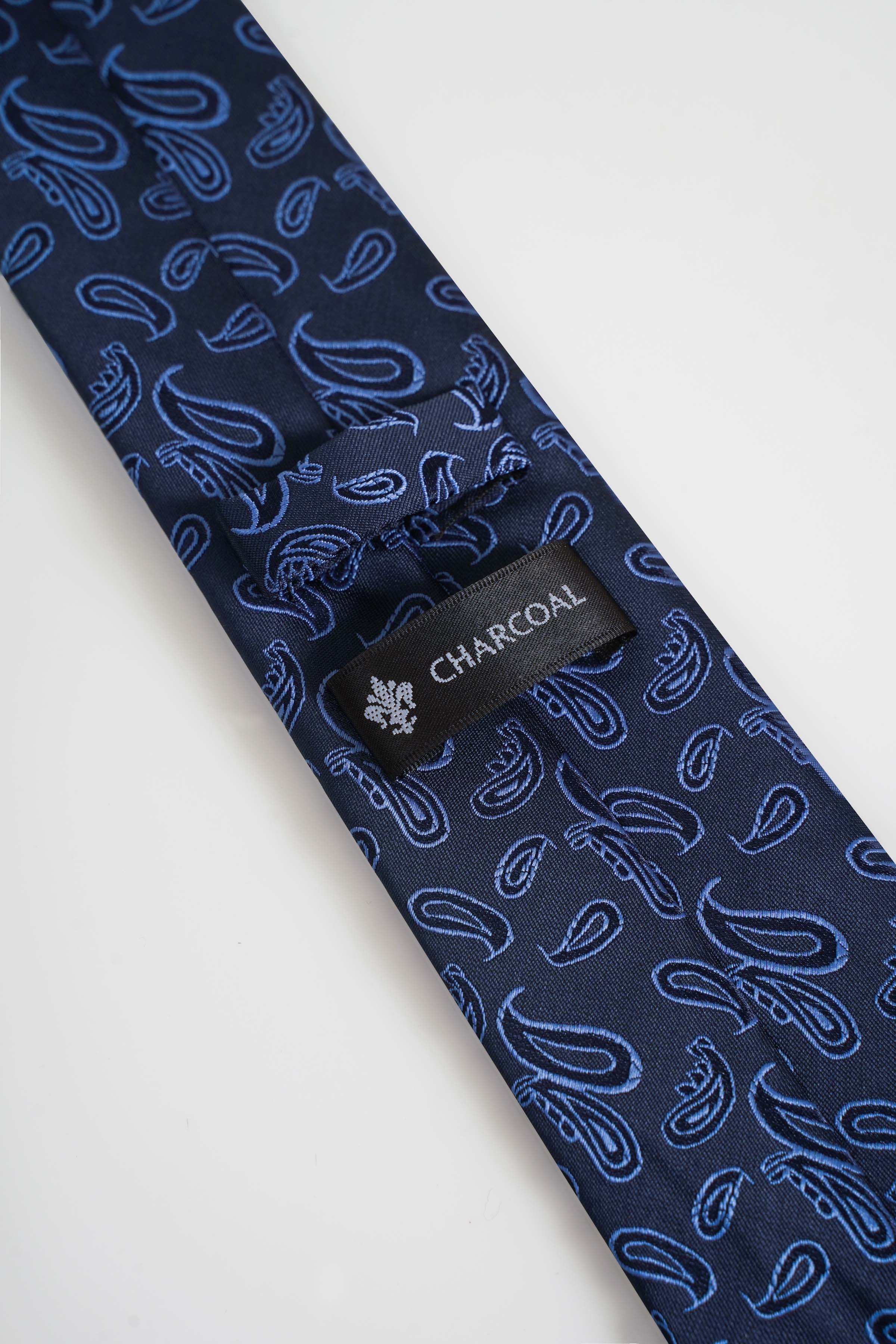 Blue poly silk tie with paisley pattern and label reading CHARCOAL