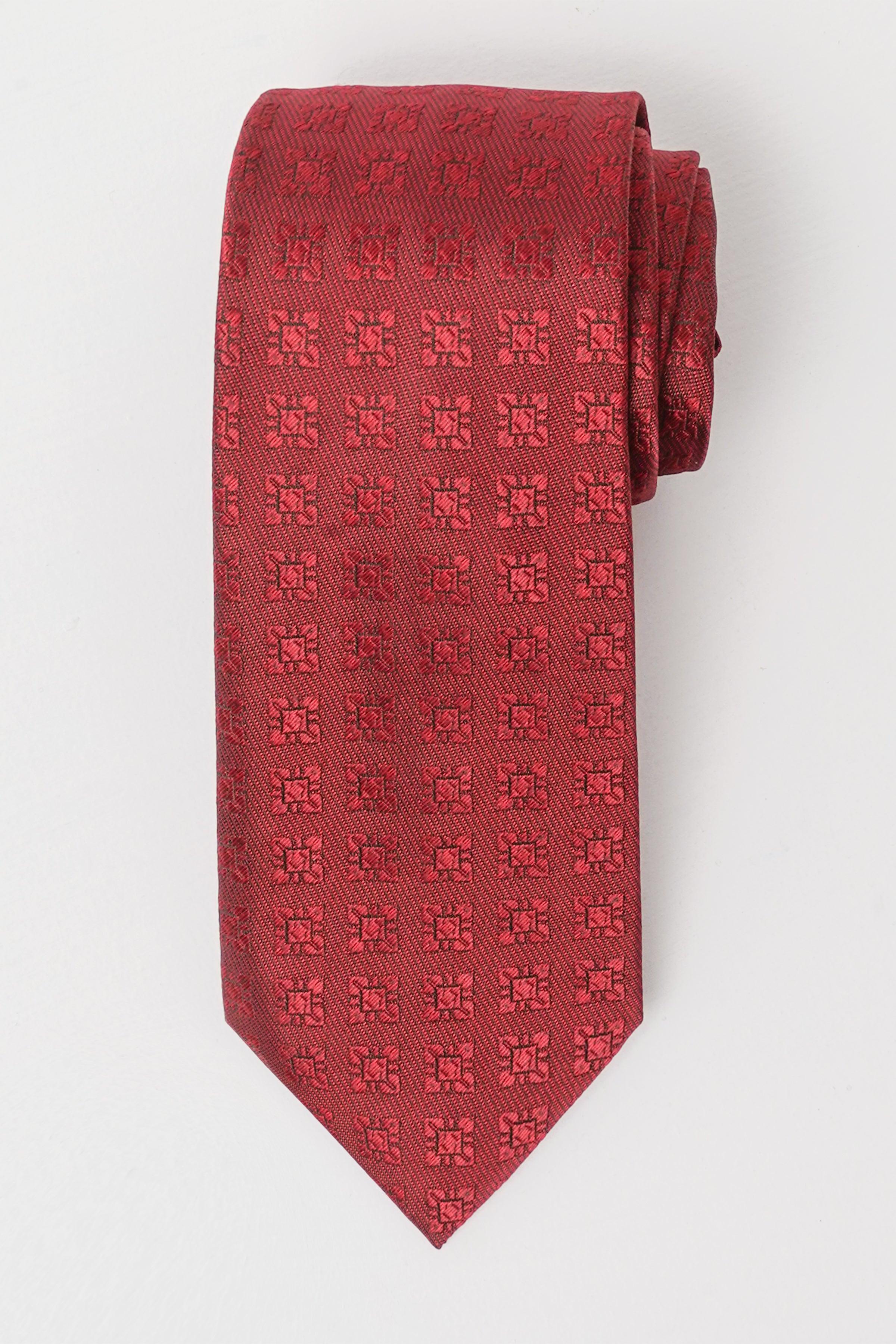 Red poly silk tie with narrow repeating square motif pattern