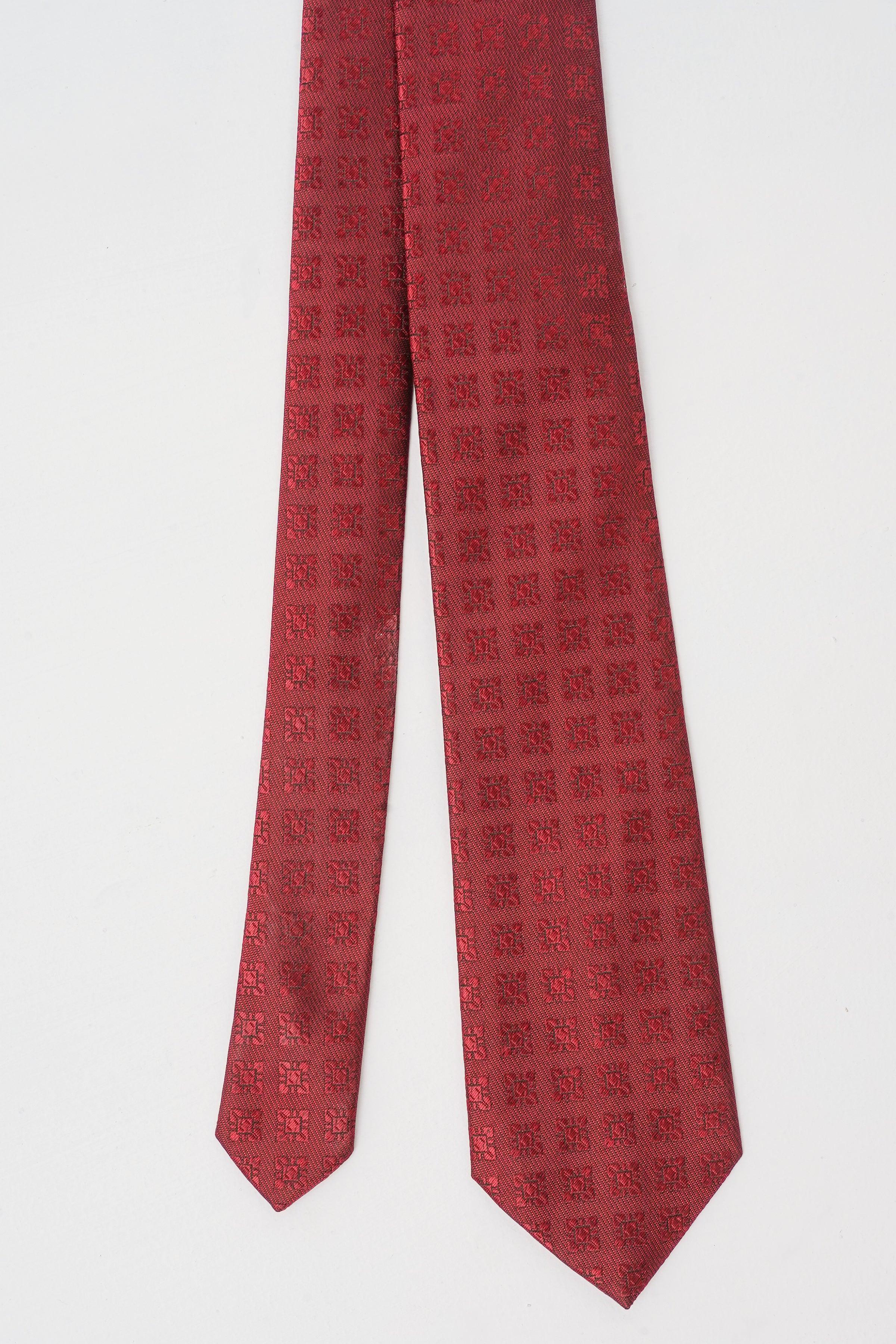 Red poly silk tie with repeating square motif pattern
