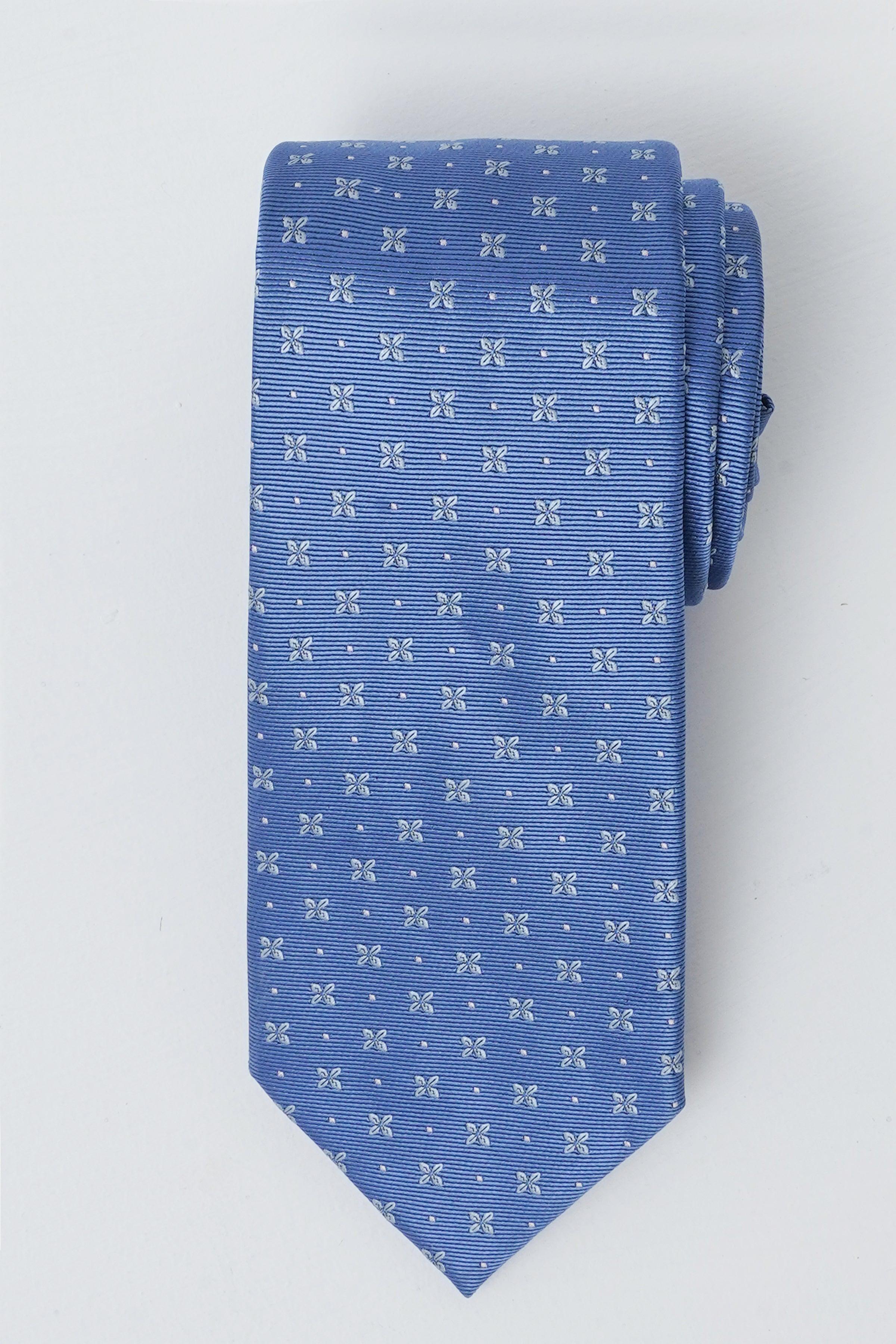 Blue poly silk necktie with tiny white bow and dot pattern, straight tip