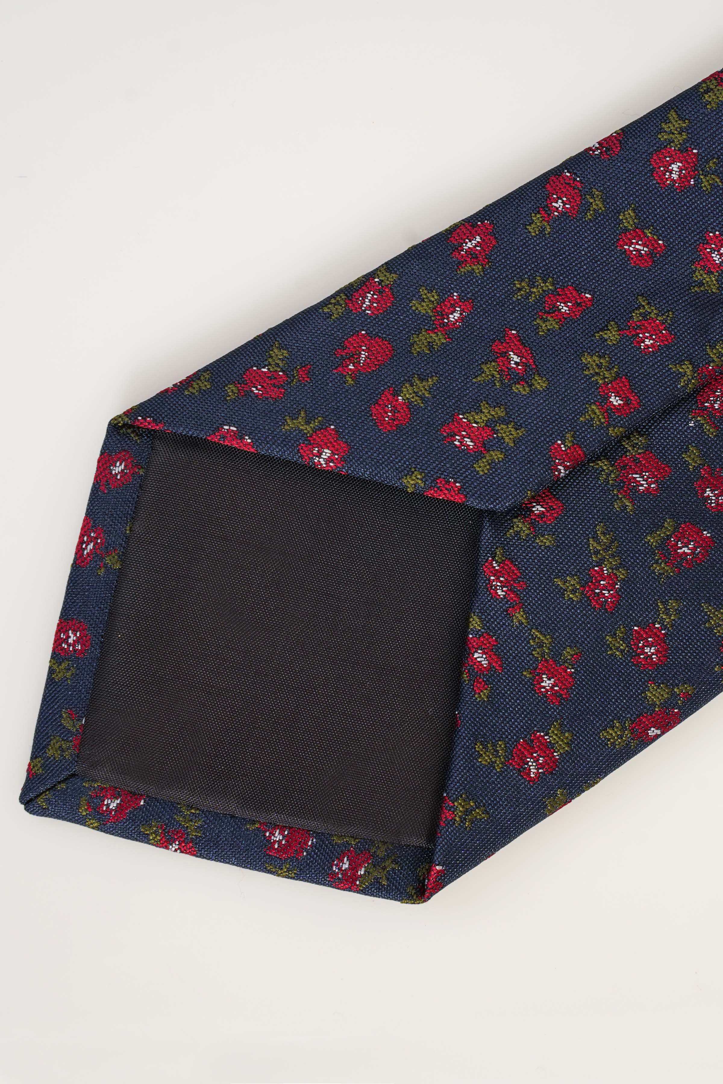 Navy poly silk tie with red and green floral print and dark underside