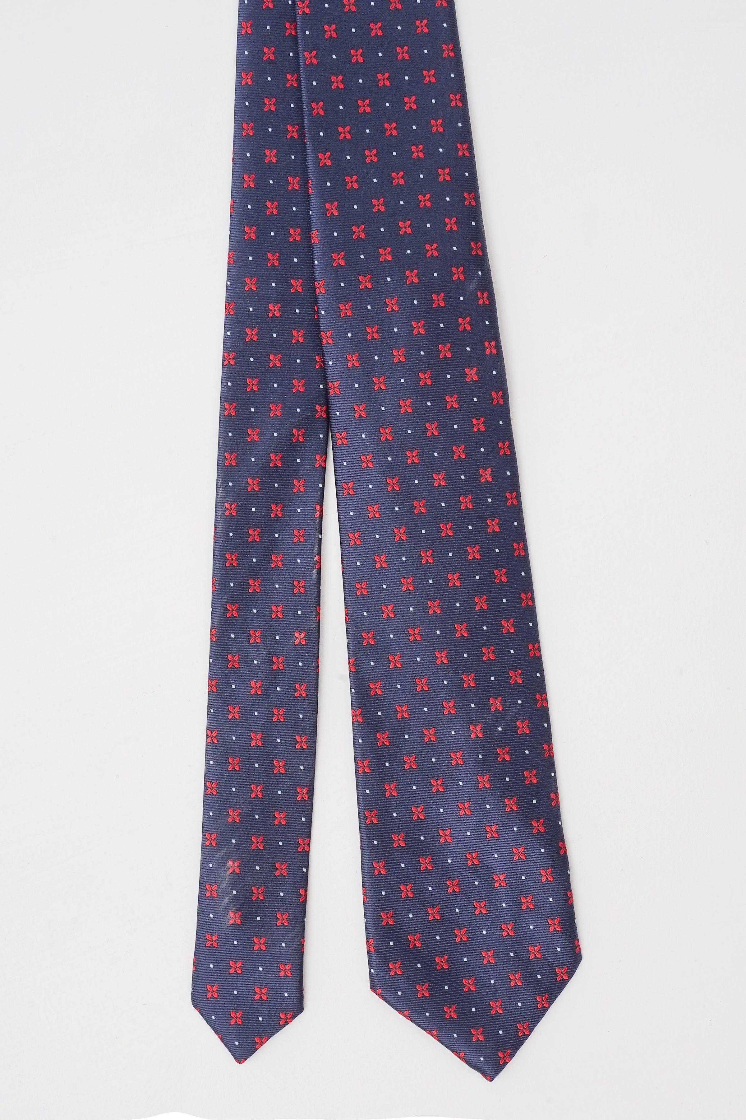 Navy poly silk necktie with allover small red pattern, pointed ends