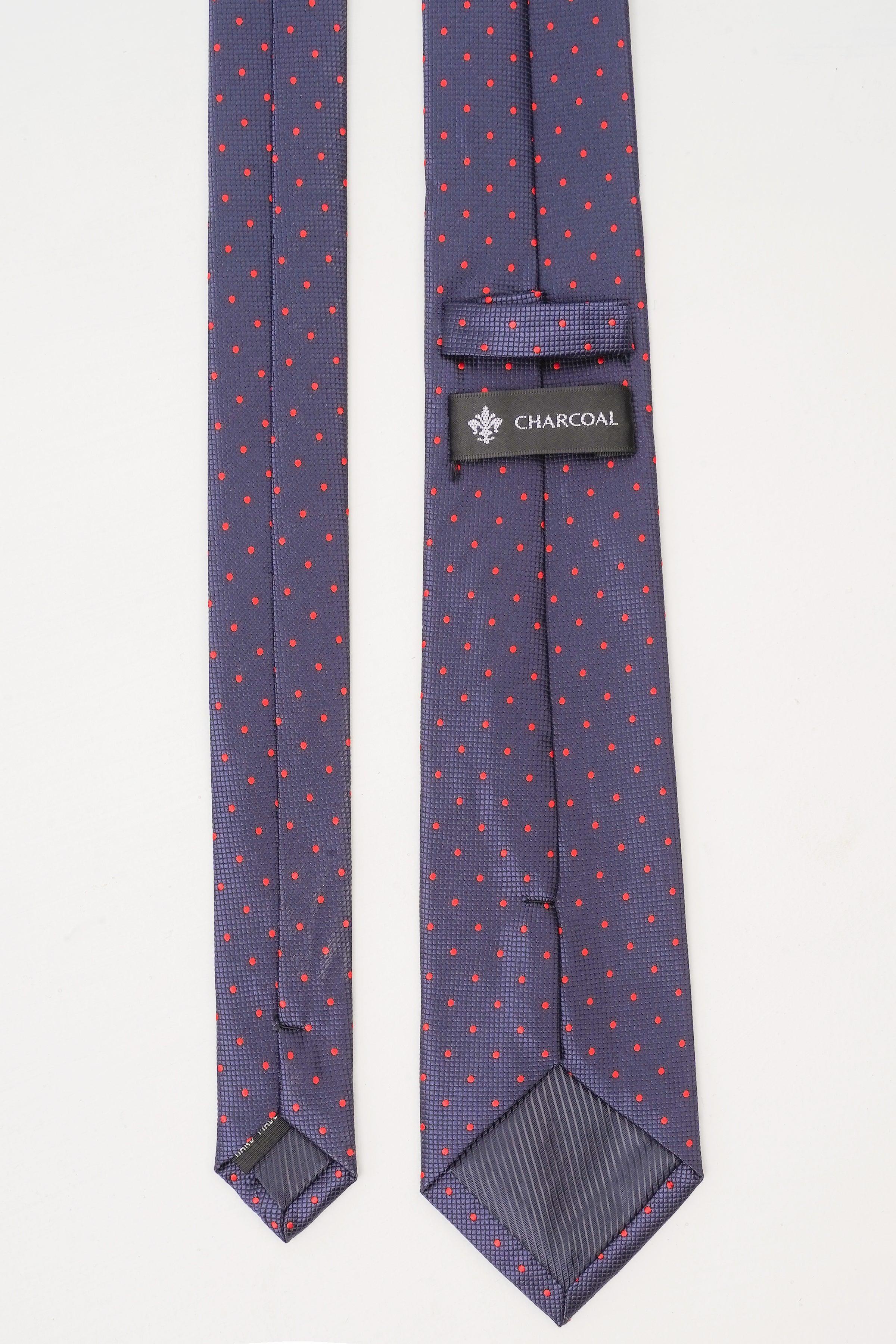 Poly silk tie with red dot pattern and CHARCOAL label on keeper