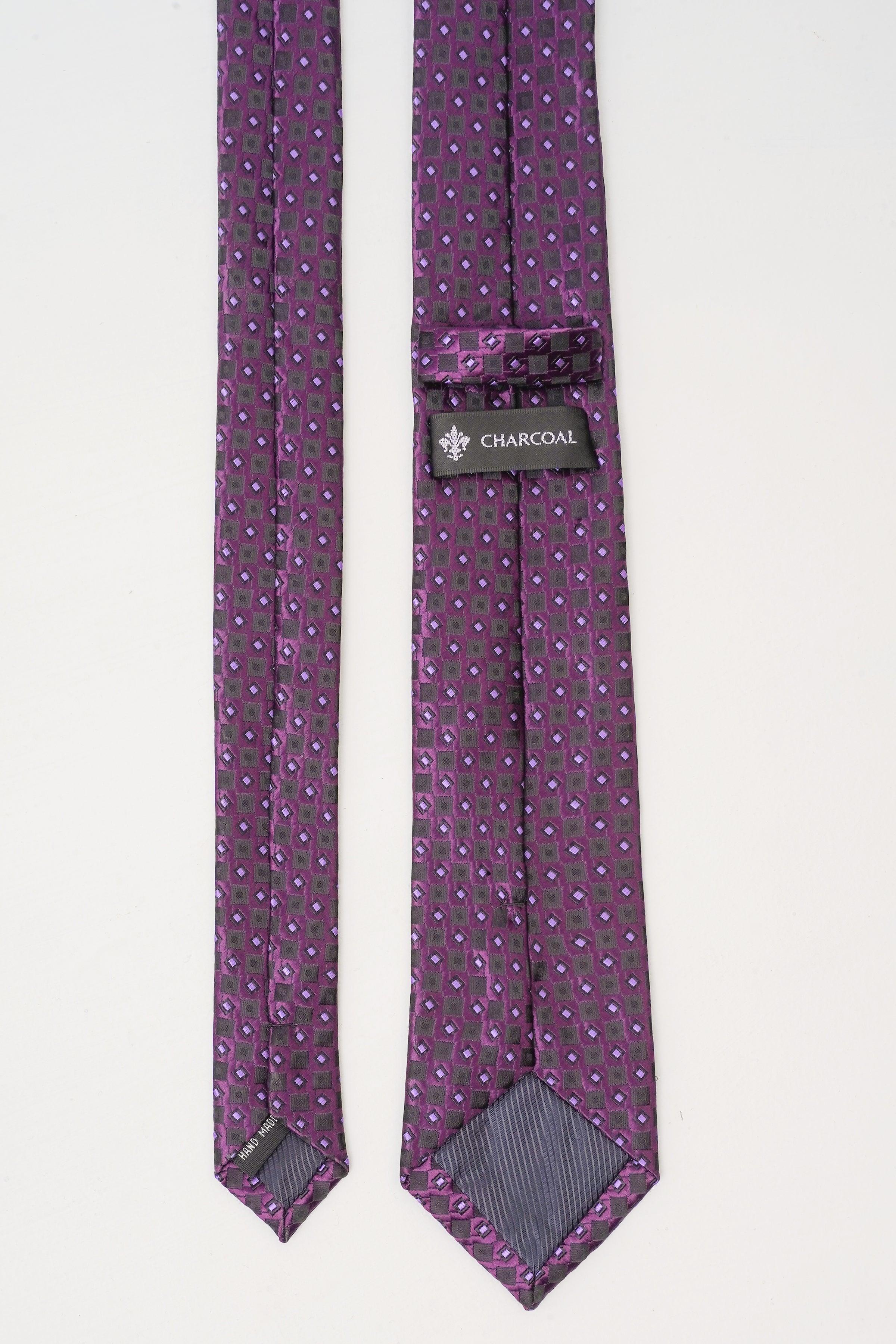 Poly silk tie in dark purple with geometric dots and squares, back label CHARCOAL