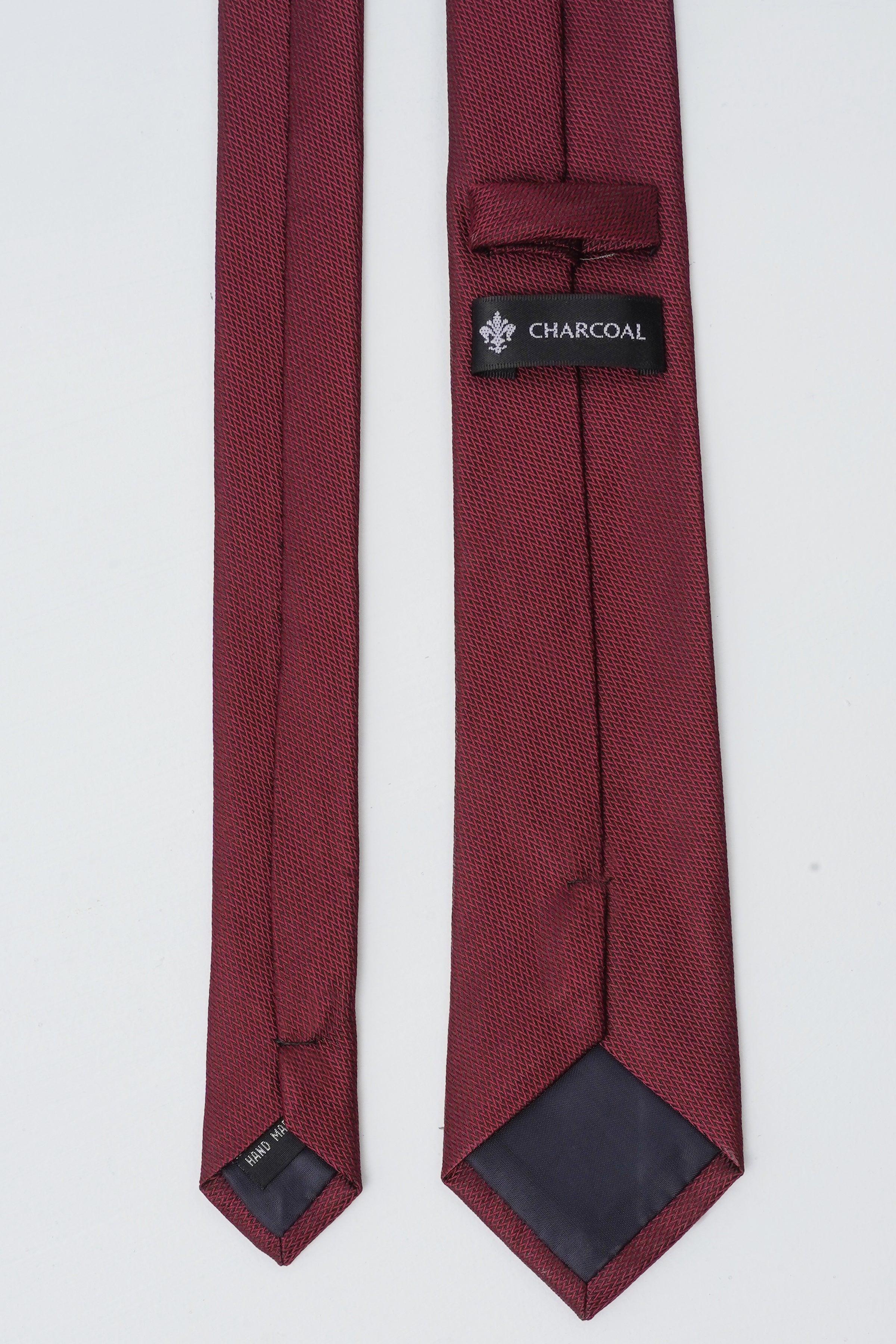 Burgundy poly-silk necktie with logo label and dark gray keeper tabs