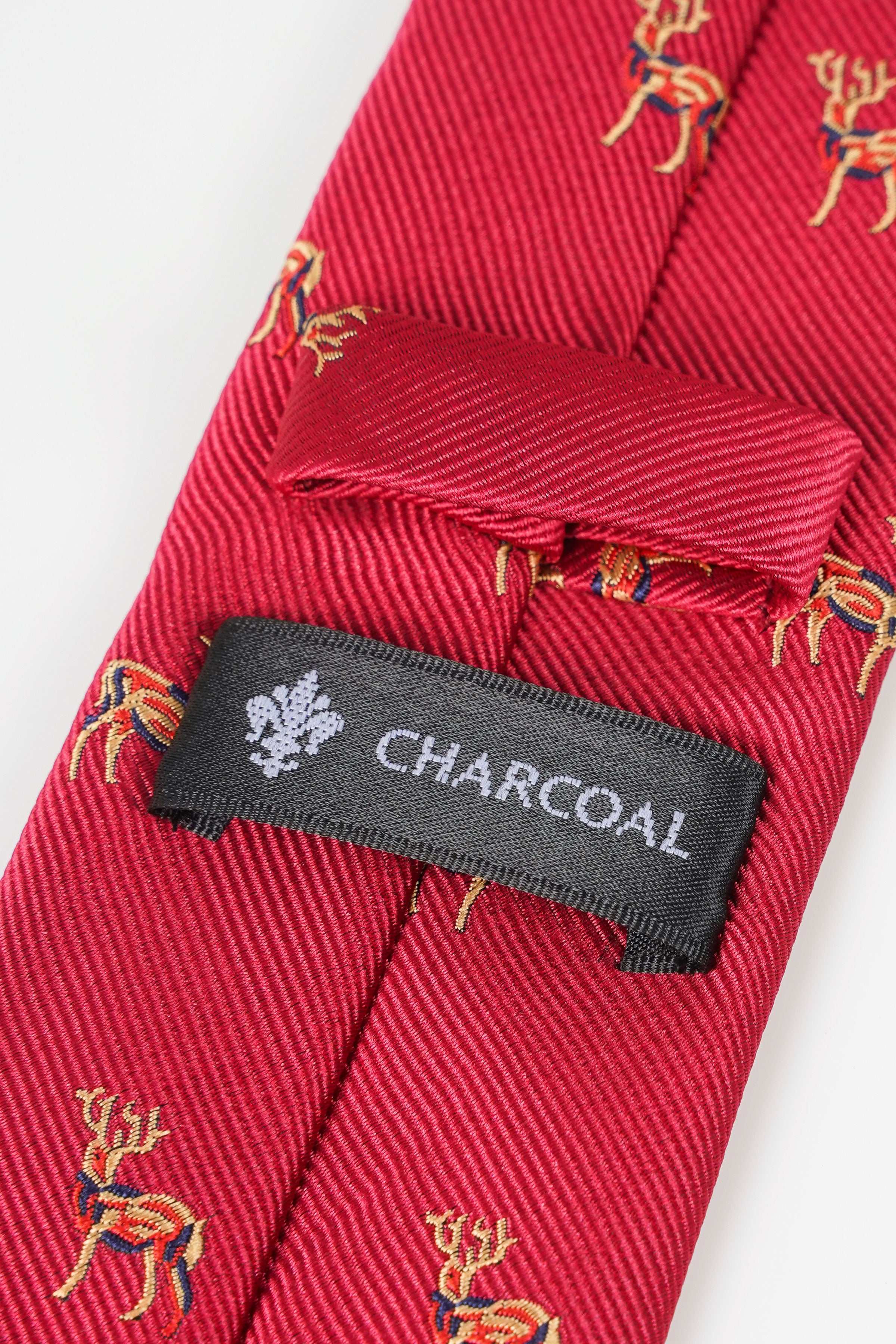 Red poly silk tie with gold animal print and charcoal brand label detail