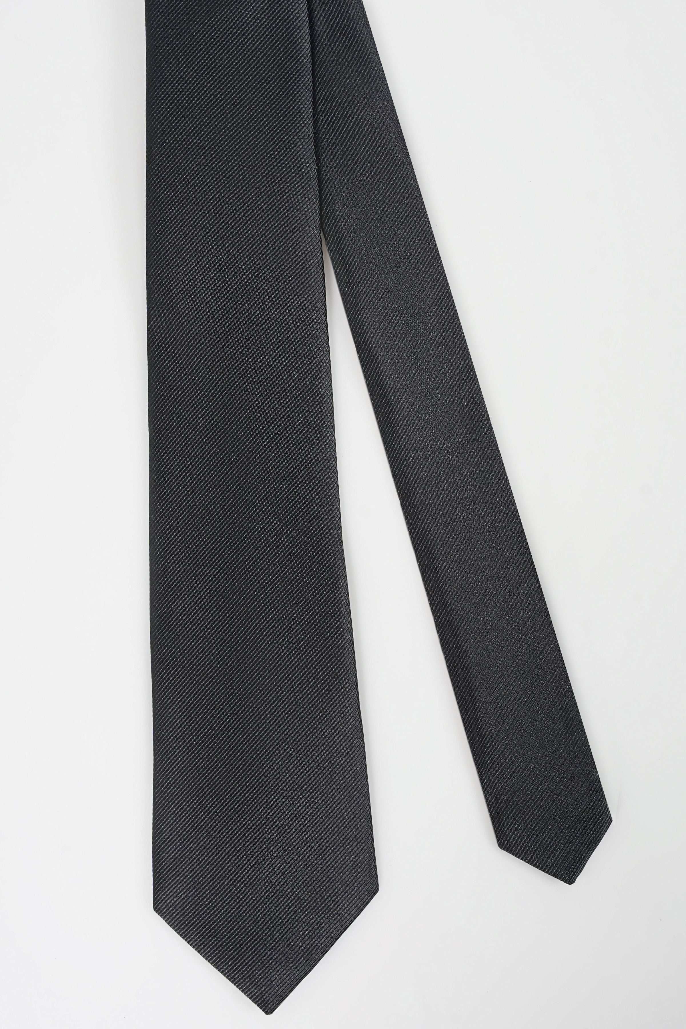 Dark poly silk tie with textured diagonal weave, pointed end