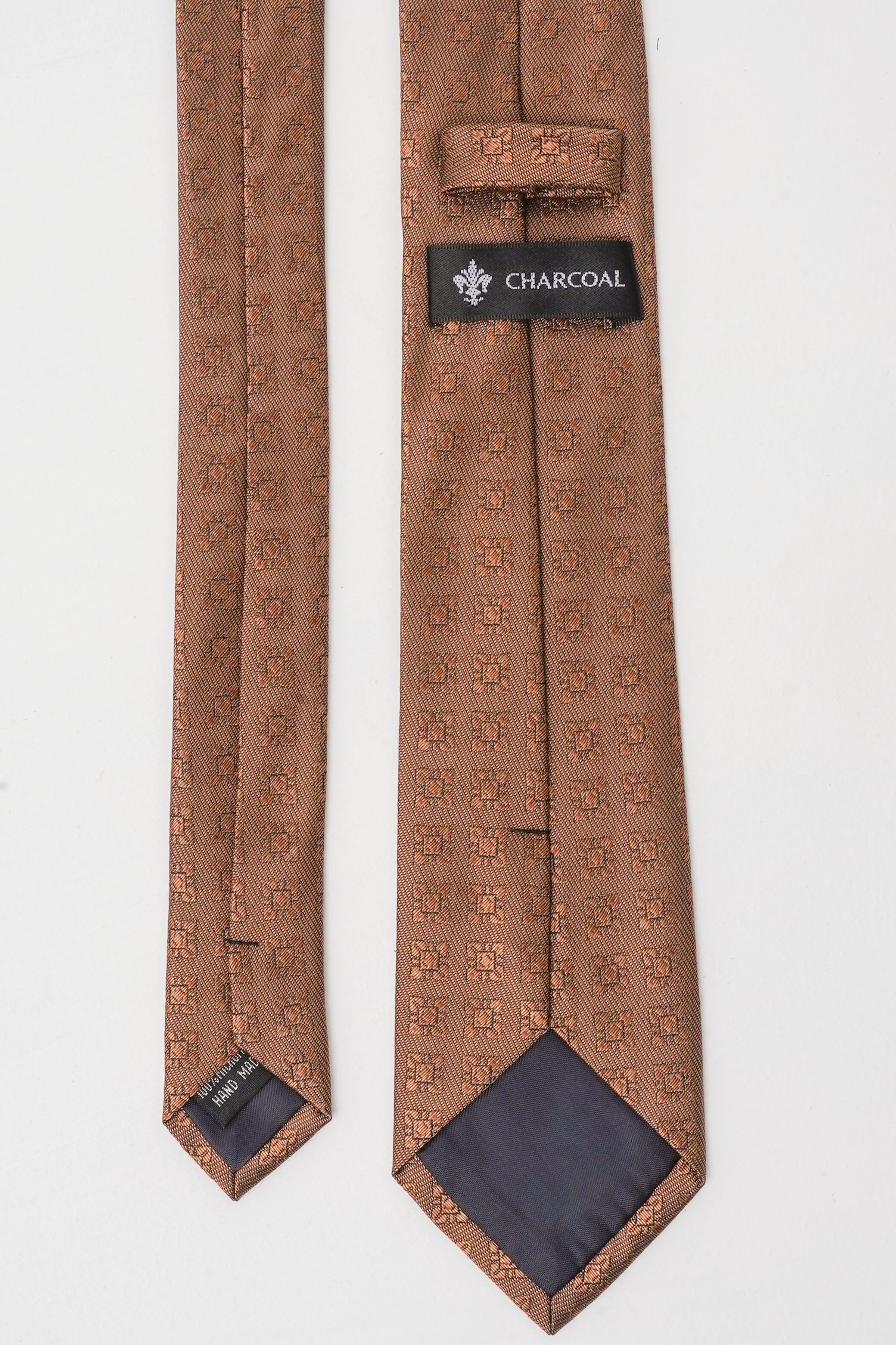 Brown poly silk necktie, logo pattern, charcoal label and dark tip trim.