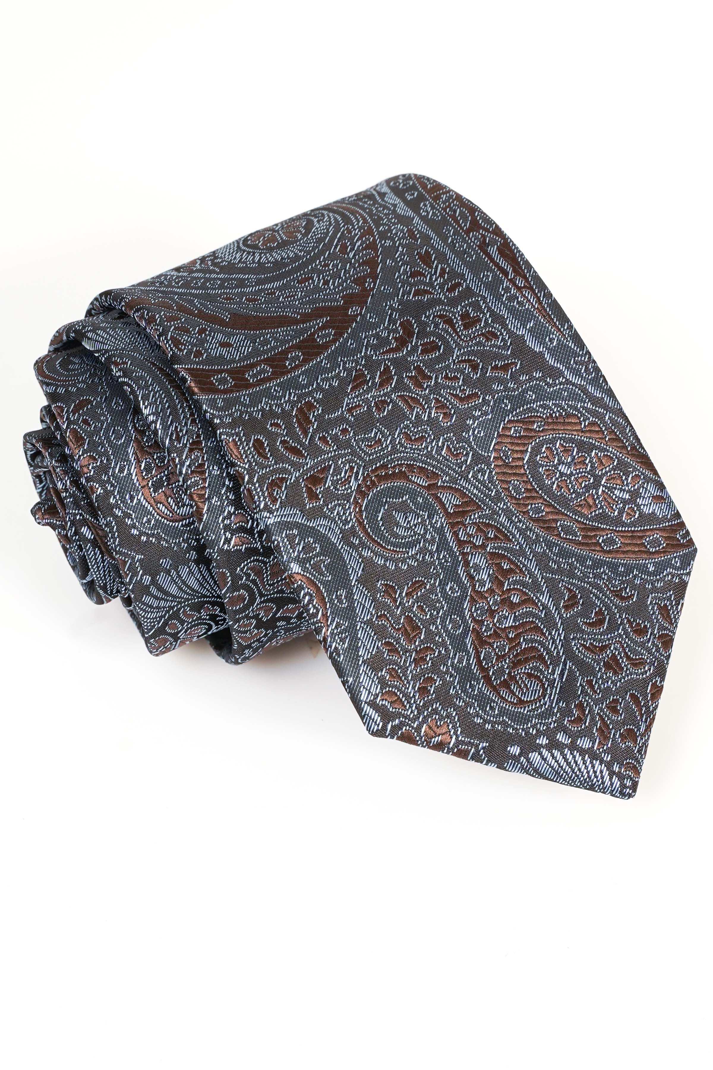 Paisley polyester tie, dark blue with rust and teal accents, folded.