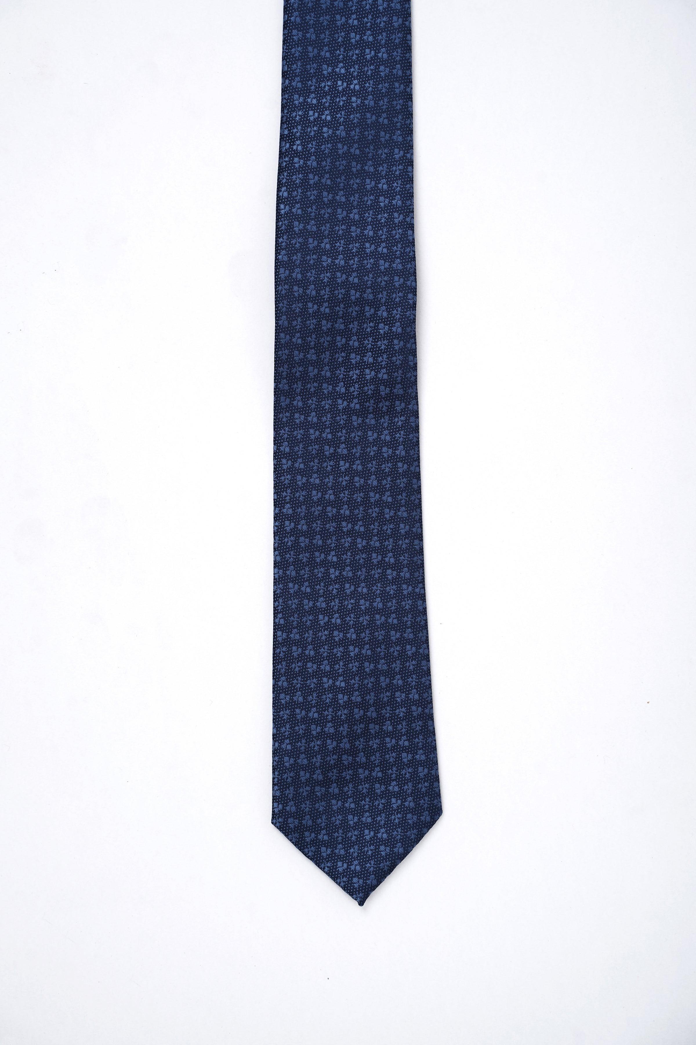 Poly silk tie, dark navy with tiny repeating pattern, straight hanging view