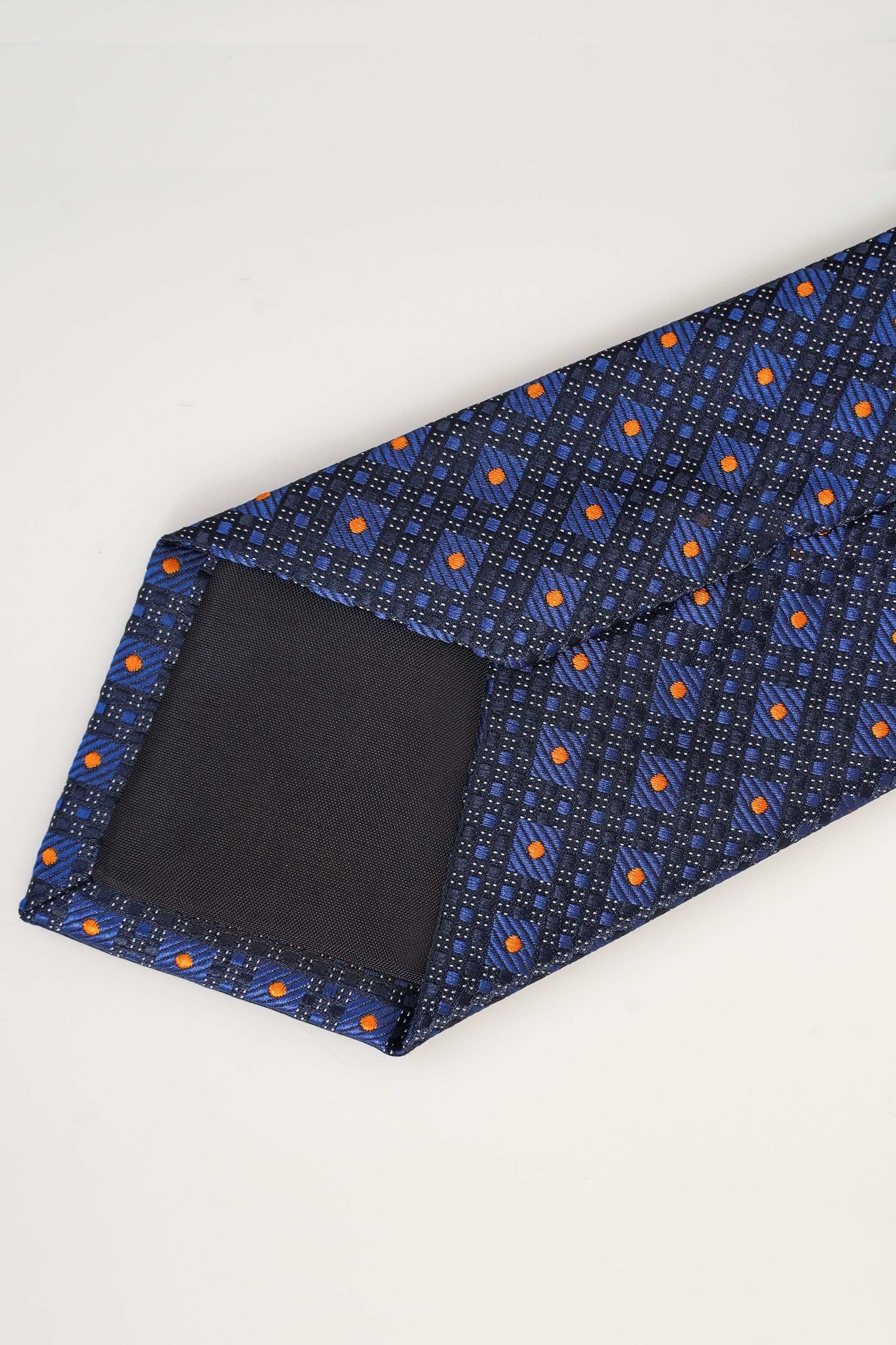 Navy blue poly silk tie showing wide end with geometric pattern