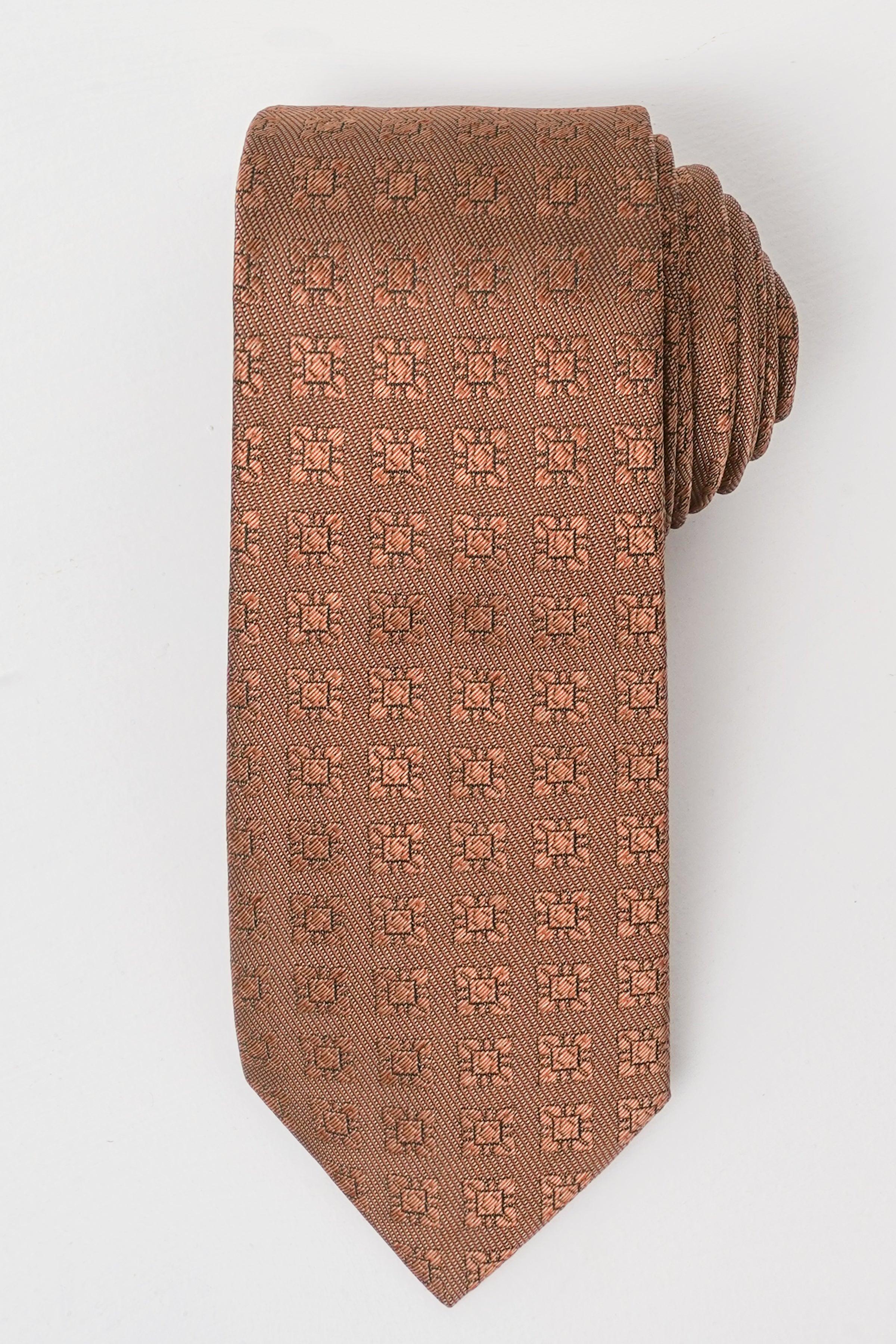 Brown poly silk necktie with repeating logo pattern and textured finish.