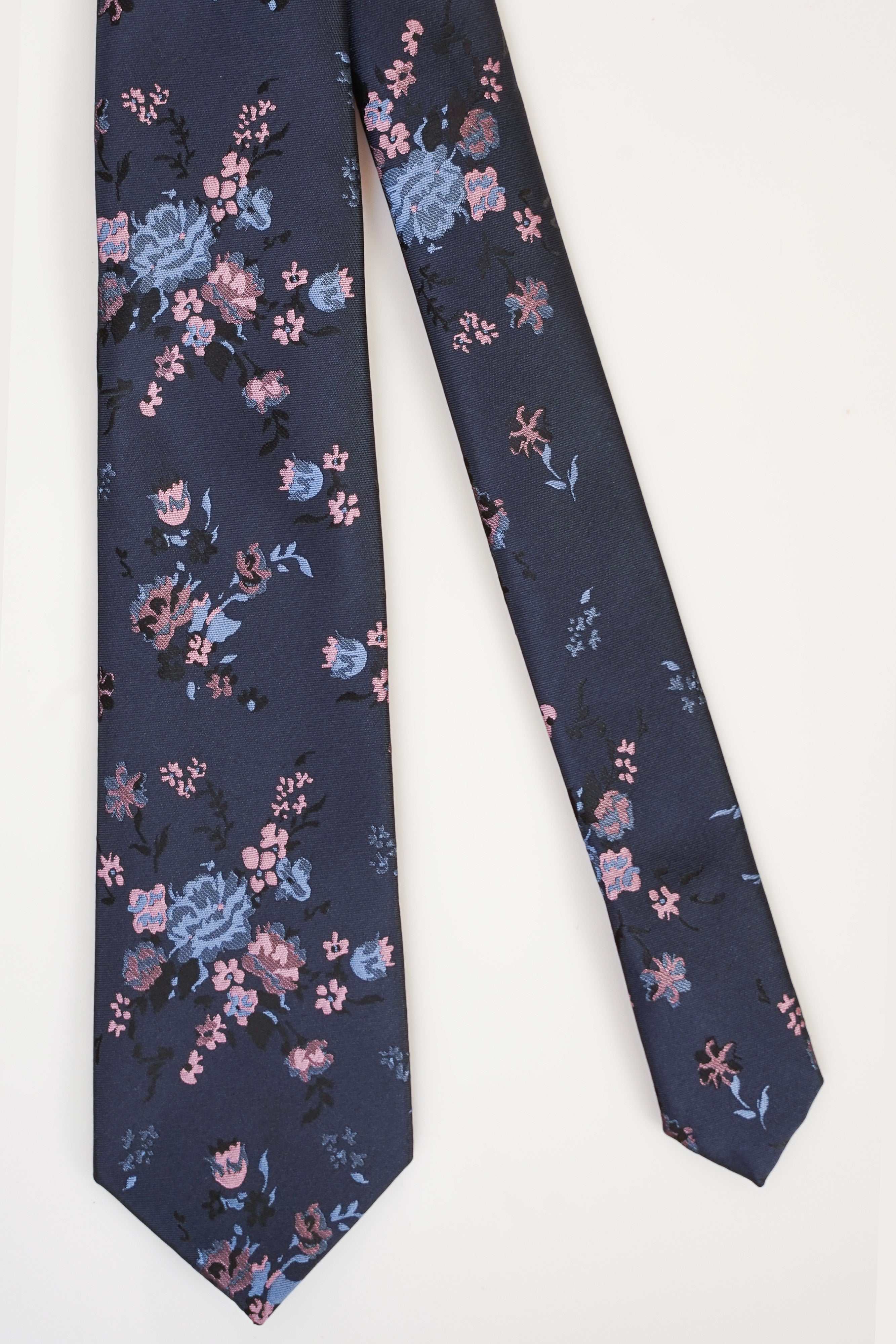 Poly silk tie, dark blue with small floral print.